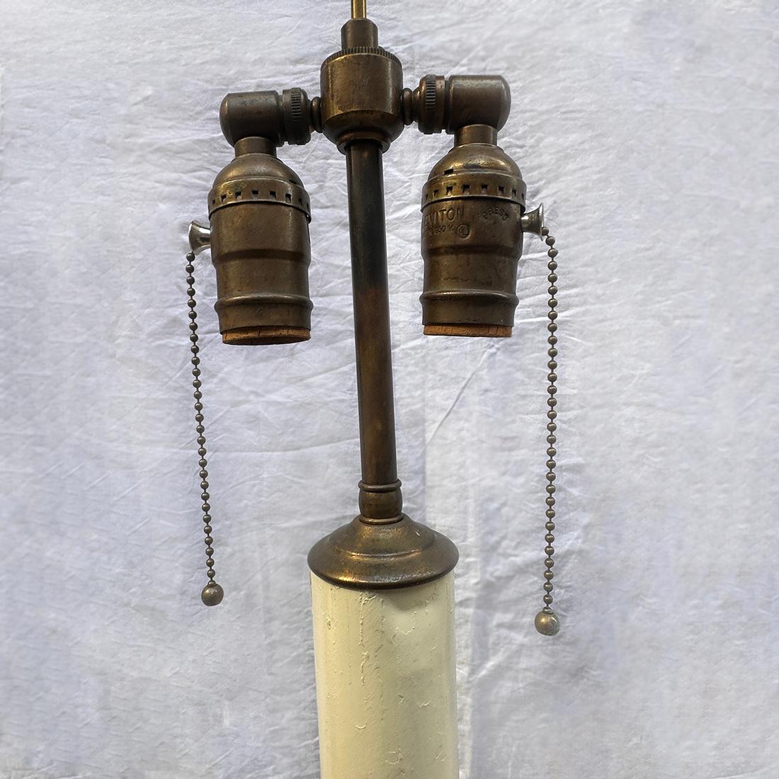 A circa 1950's French gilt iron floor lamp.

Measurements: 
Height to shade rest: 67