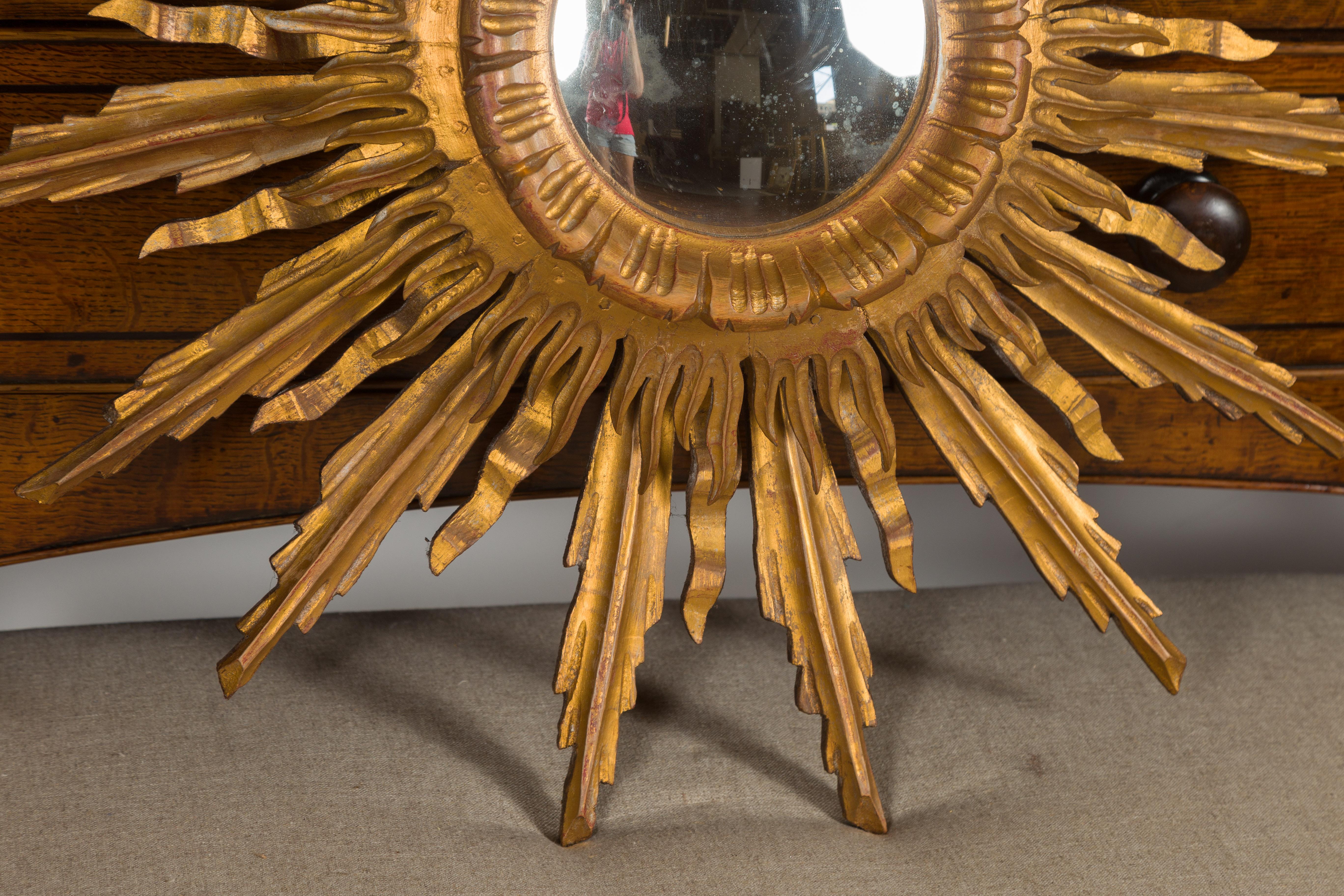 Mid-Century Modern French Vintage Giltwood Midcentury Convex Sunburst Mirror with Wavy Rays