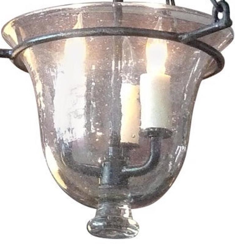 French vintage glass bell jar pendant with iron fittings with 3 centre lights.