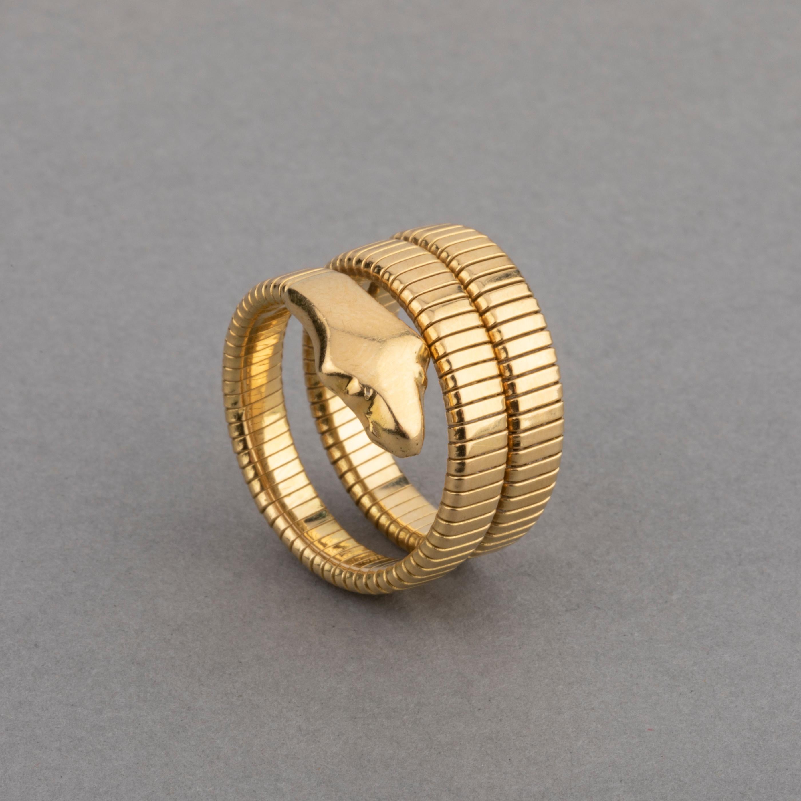French Vintage Gold Snake Ring

Very lovely snake ring, made in France Circa 1970. 
18k gold, hallmark for gold (the eagle).
Size 51 europe or 5.5 Us, sizeable
Total weight 12.90 grams