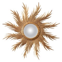 Miroir Starburst en or de style franais