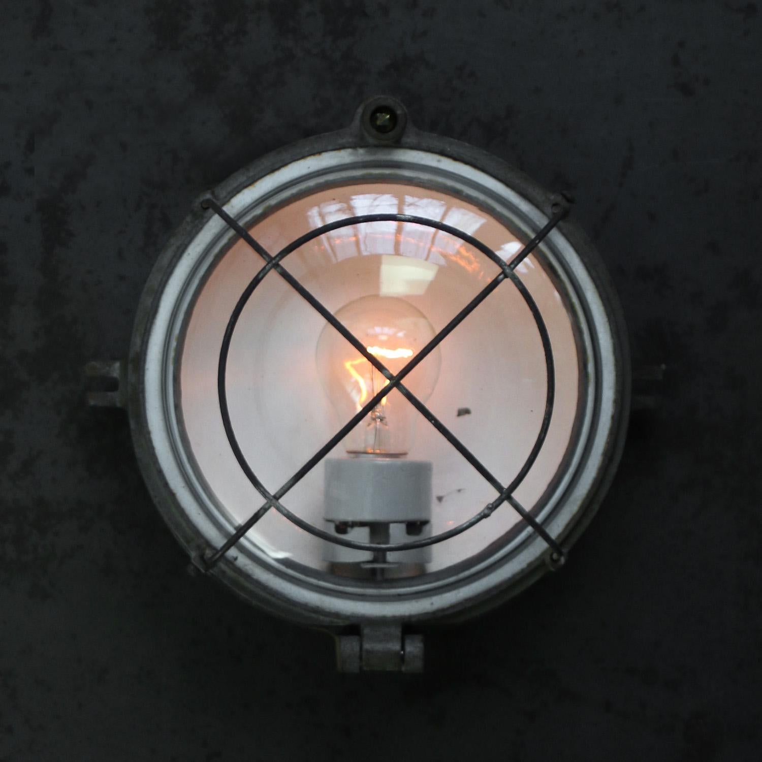 French Industrial wall / ceiling lamp
Cast iron back with clear glass.

Weight : 3.00 kg / 6.6 lb

Priced per individual item. All lamps have been made suitable by international standards for incandescent light bulbs, energy-efficient and LED bulbs.