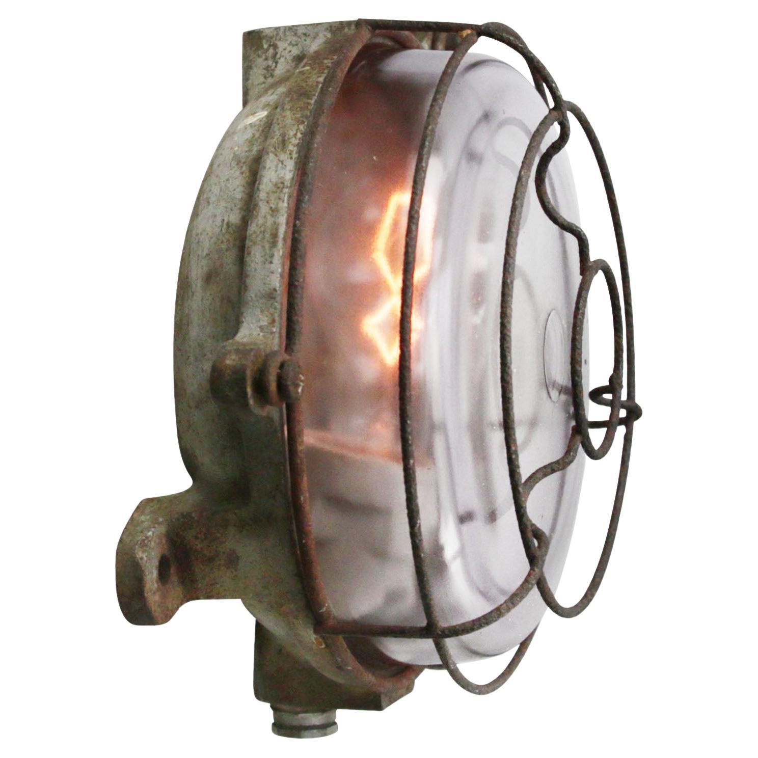 Cast Iron Vintage Industrial Holophane Glass Wall Light at 1stDibs