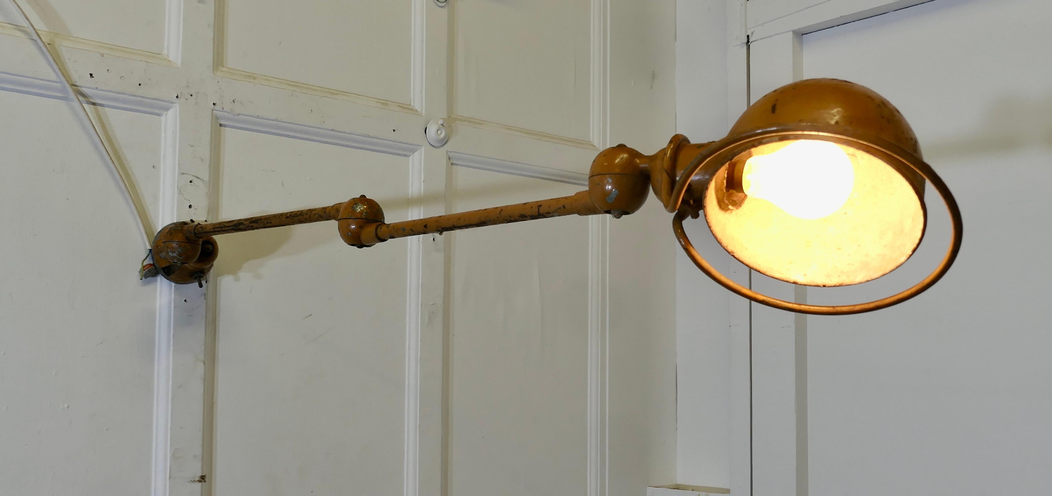 Mid-20th Century French Vintage Industrial Jielde Articulated Wall Light Sconce  This is a very u