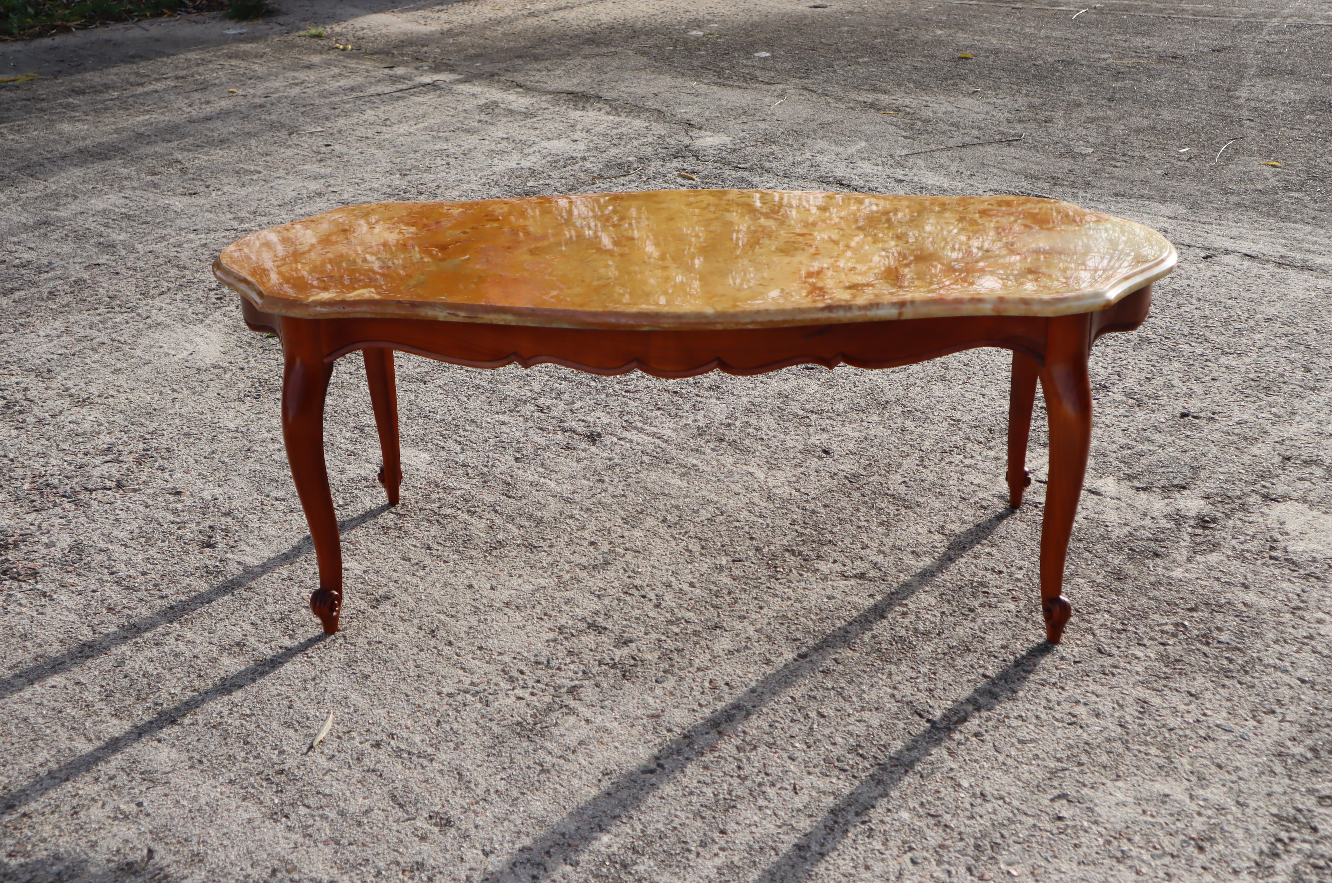 Massive French Vintage Marble - Cherrywood Coffee Table - Vintage Lounge Table - Style Louis XV from the 60s

Massive Marble Top with natural Patterns in beautiful mix of earth colors orange,ochre,beige,brown ,mother-of-pearl

The beautifully
