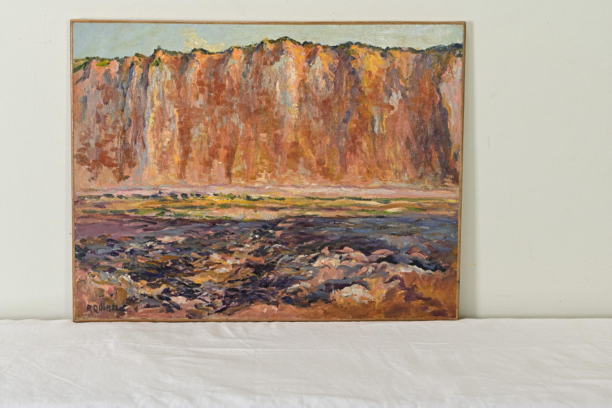 French vintage oil on canvas landscape of high red cliffs towering over the foreground, painted in an abstracted technique that allows the drama of the bold color palette to give emotion to the field of vision. Signed by the artist in the lower left