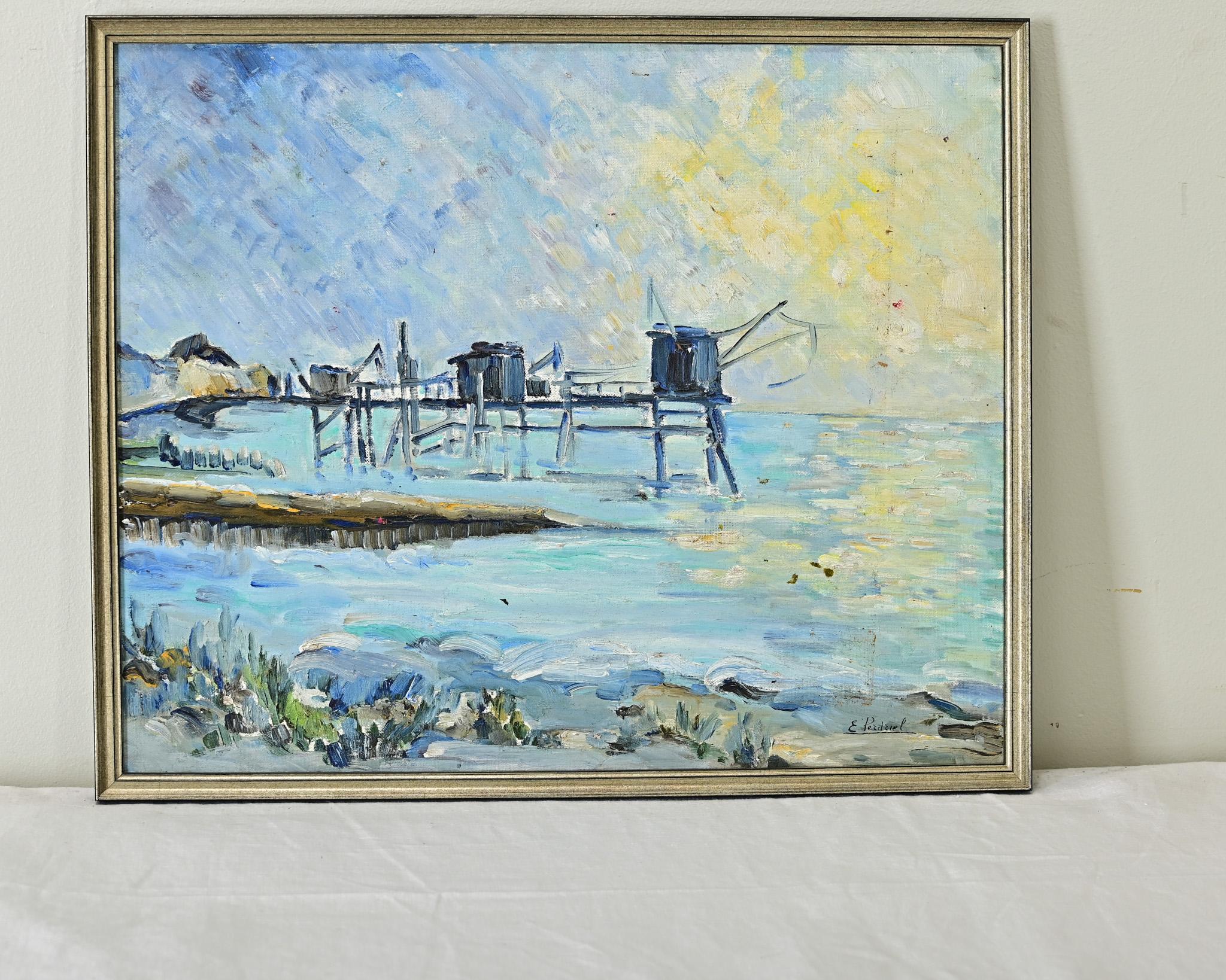 French vintage oil on panel seashore landscape, signed E. Perdriel. This colorful work, in a palette of blue tones and turquoise, depicts the yellow glow of the rising sun on the horizon, greeting a small fishing community of modest shacks on a