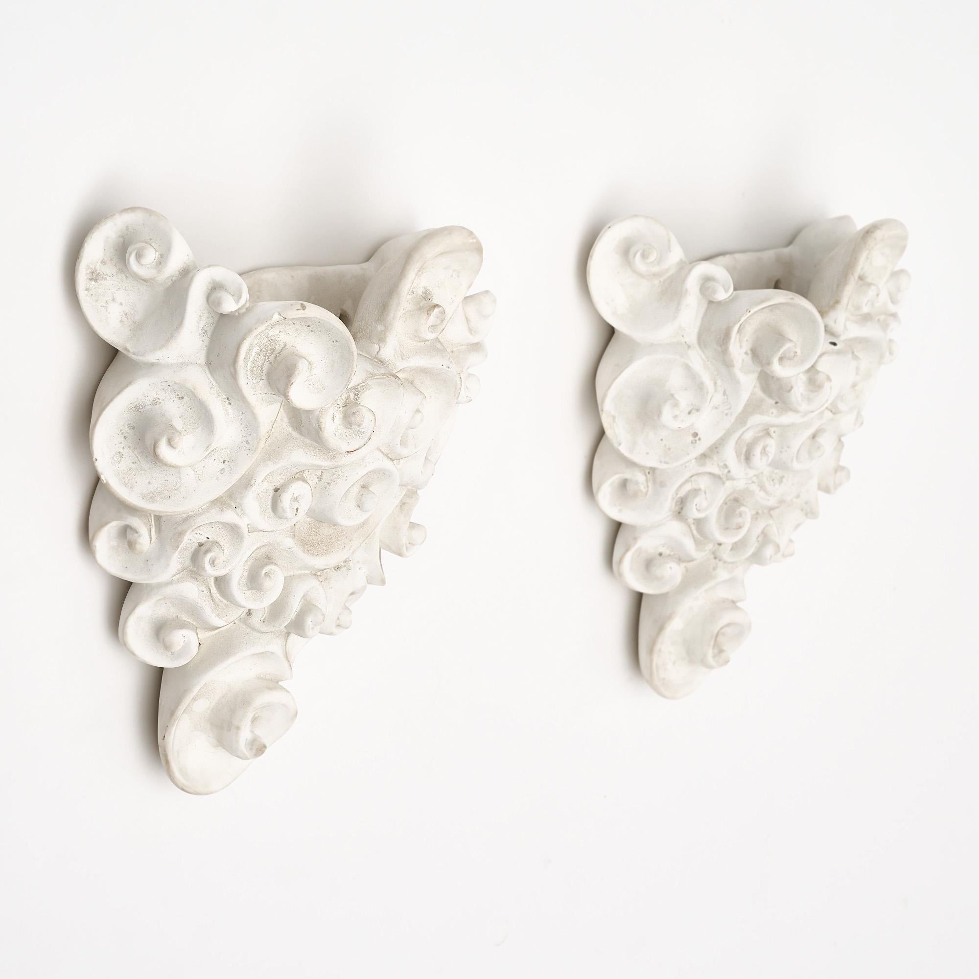 Plaster sconces or appliqués, French, in the manner of Jean Marais.