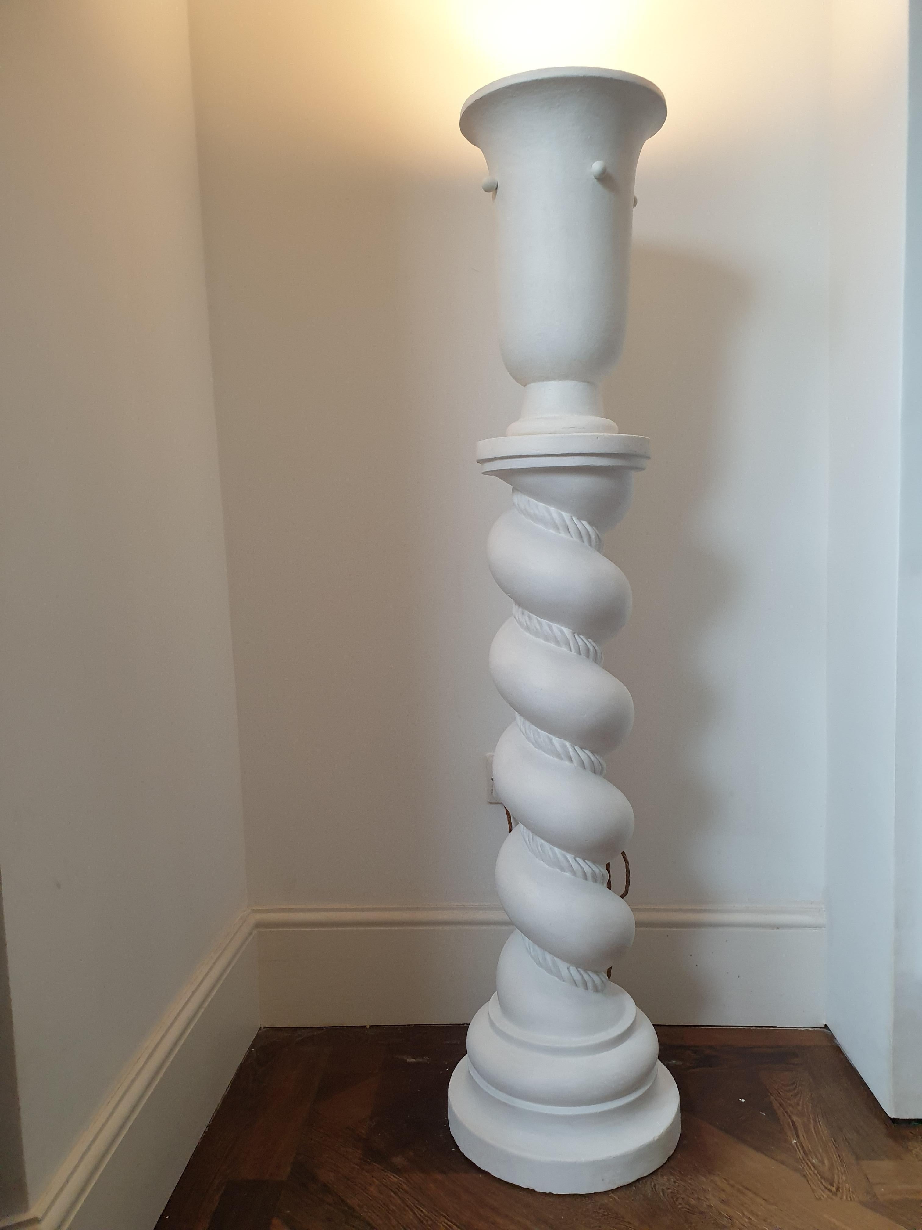 Plaster twisted column with unusual rope design and plaster uplighter.  It is rare to find such an unusual column with this rope design and coupled with the plaster urn uplighter it makes an interesting statement piece. This heavy column is stable