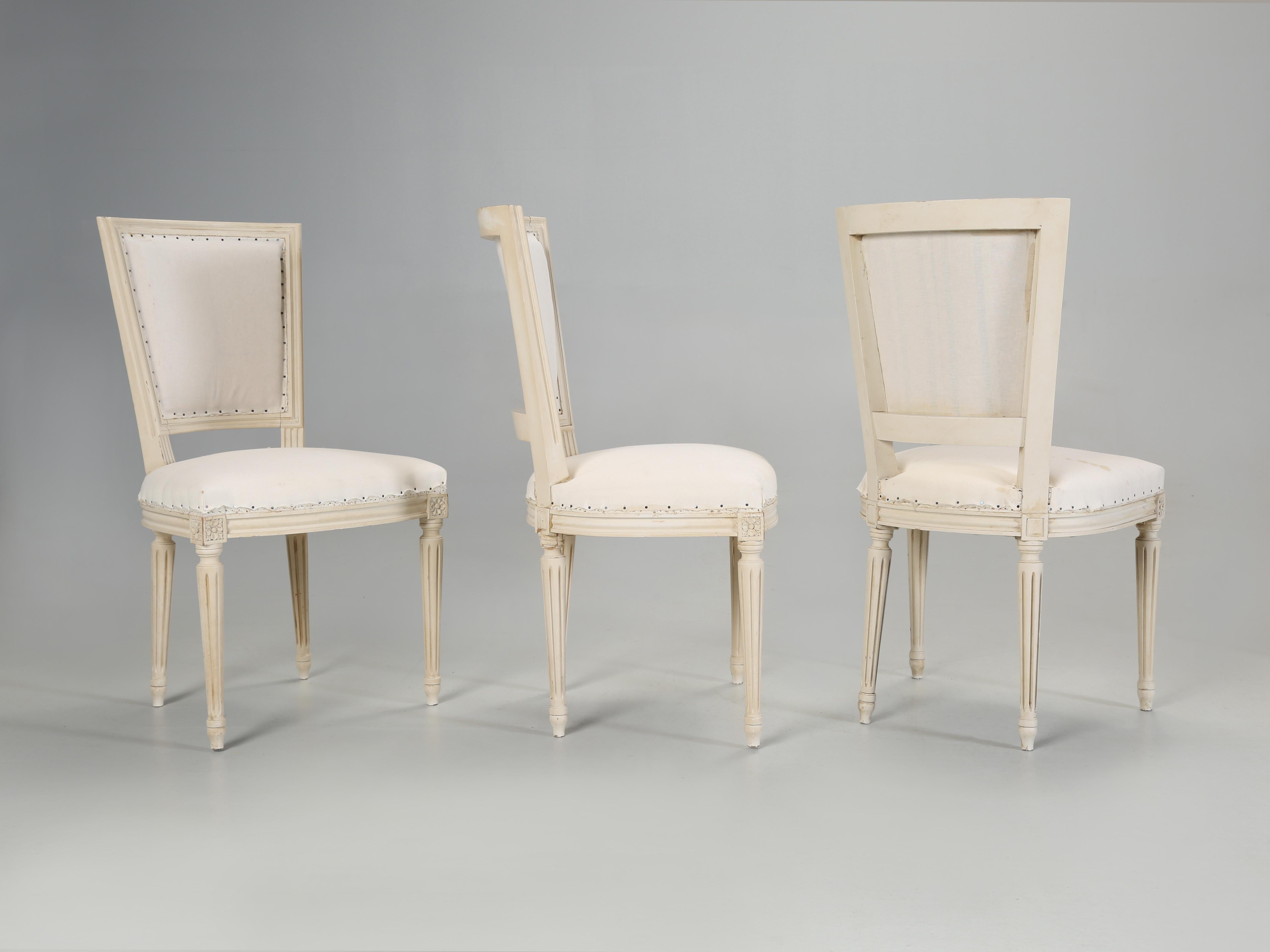 Vintage set of (6) French Louis XVI Dining Chairs in their Original Painted finish, sort of. Actually, the set of (6) Louis XVI Dining Chairs had a yellowish tint or possibly a glaze that we merely washed off and the soft creamy white paint was