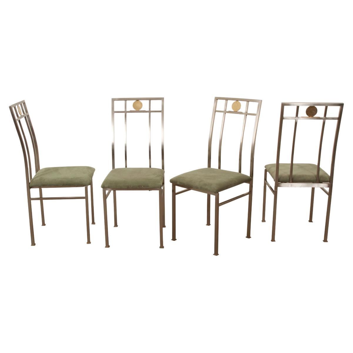 Ensemble de quatre chaises vintage françaises de style mi-siècle moderne en vente