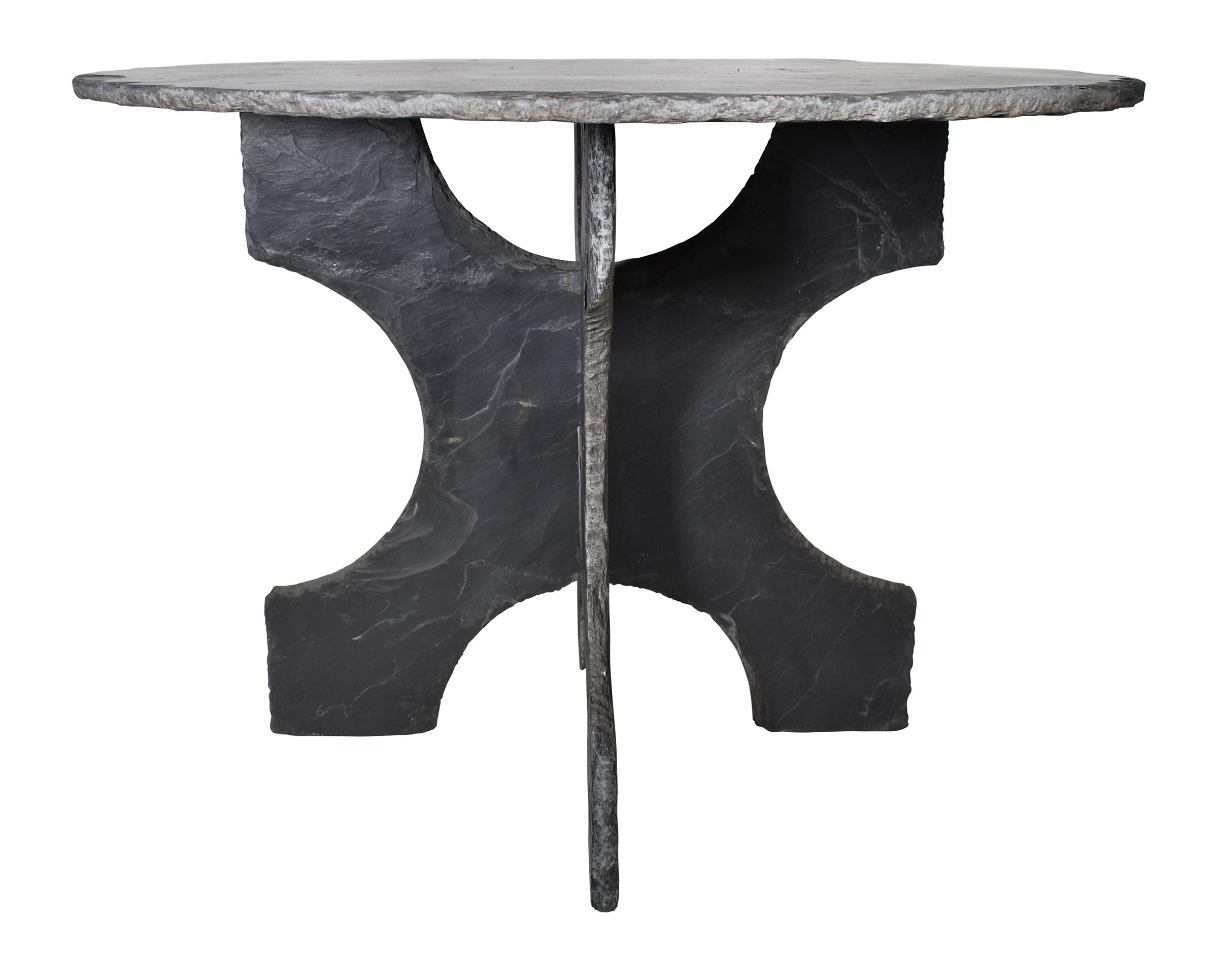 French, round slate dining, foyer, or garden table, with thick slate top with two-piece slate trestle base.

 