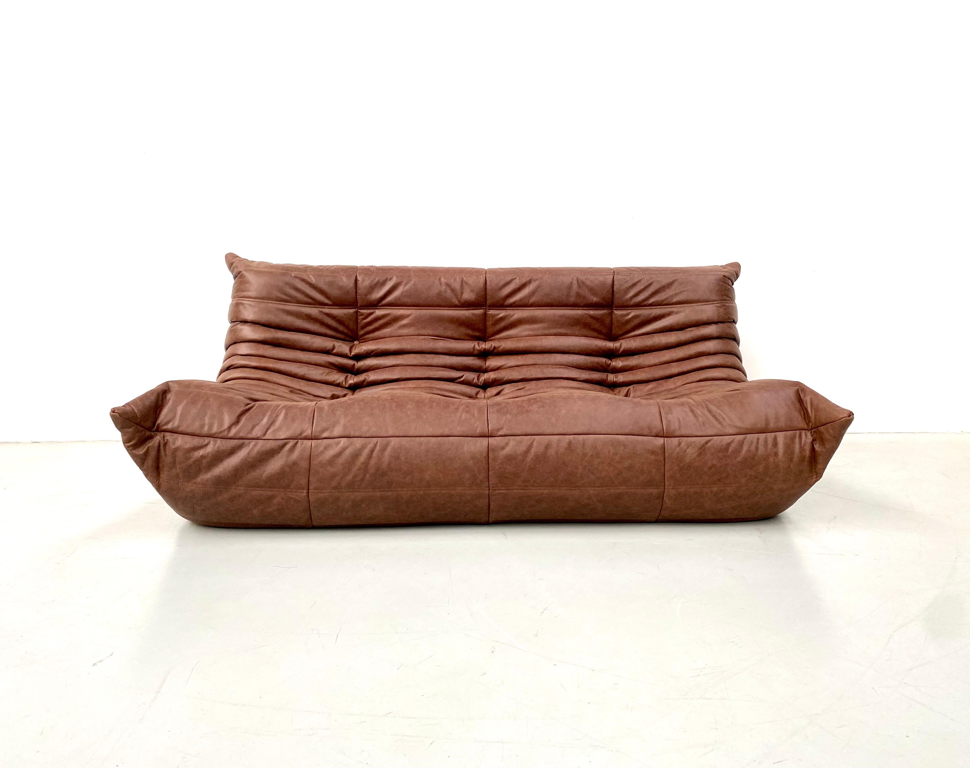 The Togo was designed by Michel Ducaroy in 1973 for Ligne Roset. It is the first sofa/chair ever made only of foam and leather. The padding consists of foam in 5 different densities.