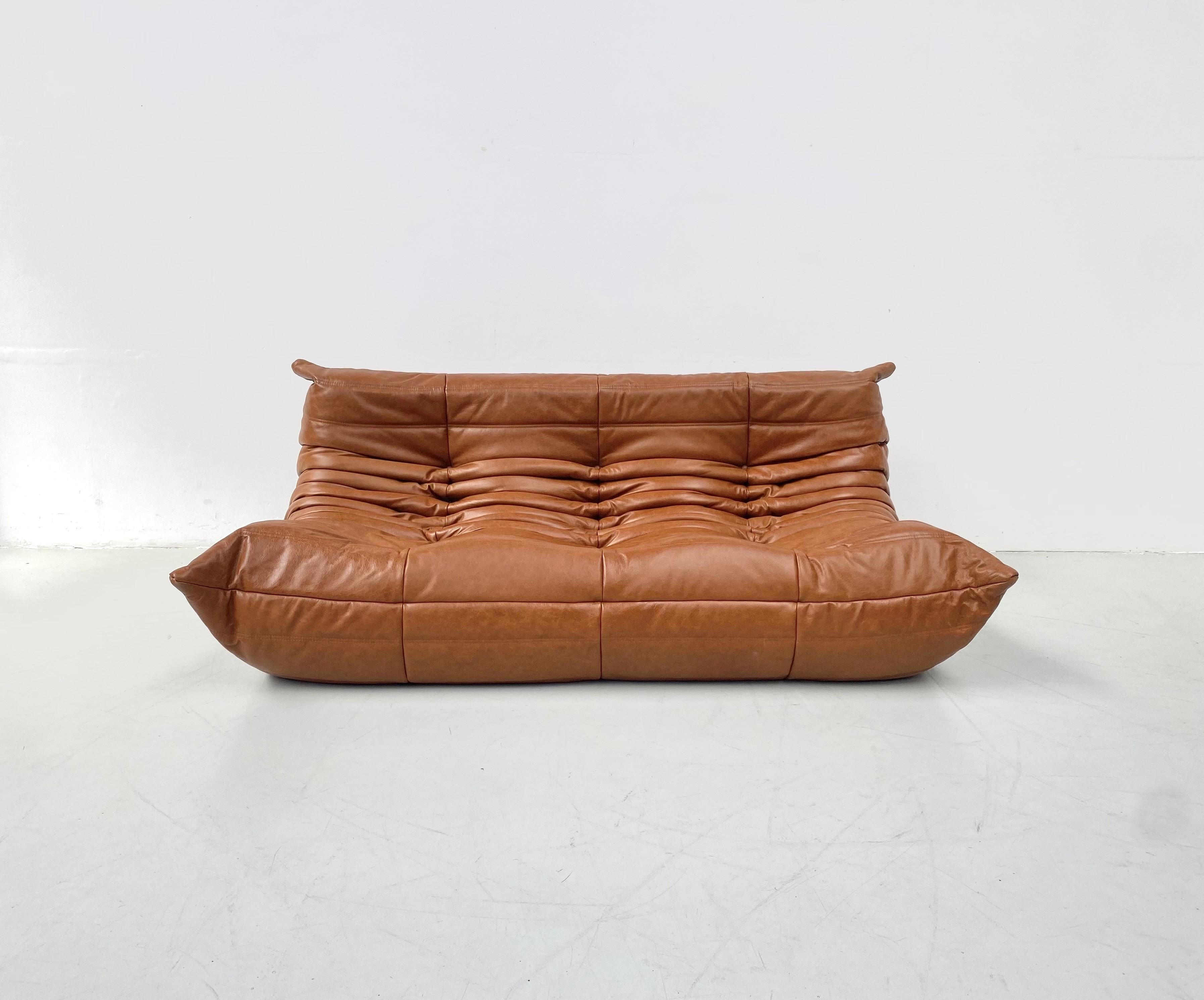 The Togo was designed by Michel Ducaroy in 1973 for Ligne Roset. It is the first sofa/chair ever made only of foam and leather. The innerwork consists of foam in 5 different densities.