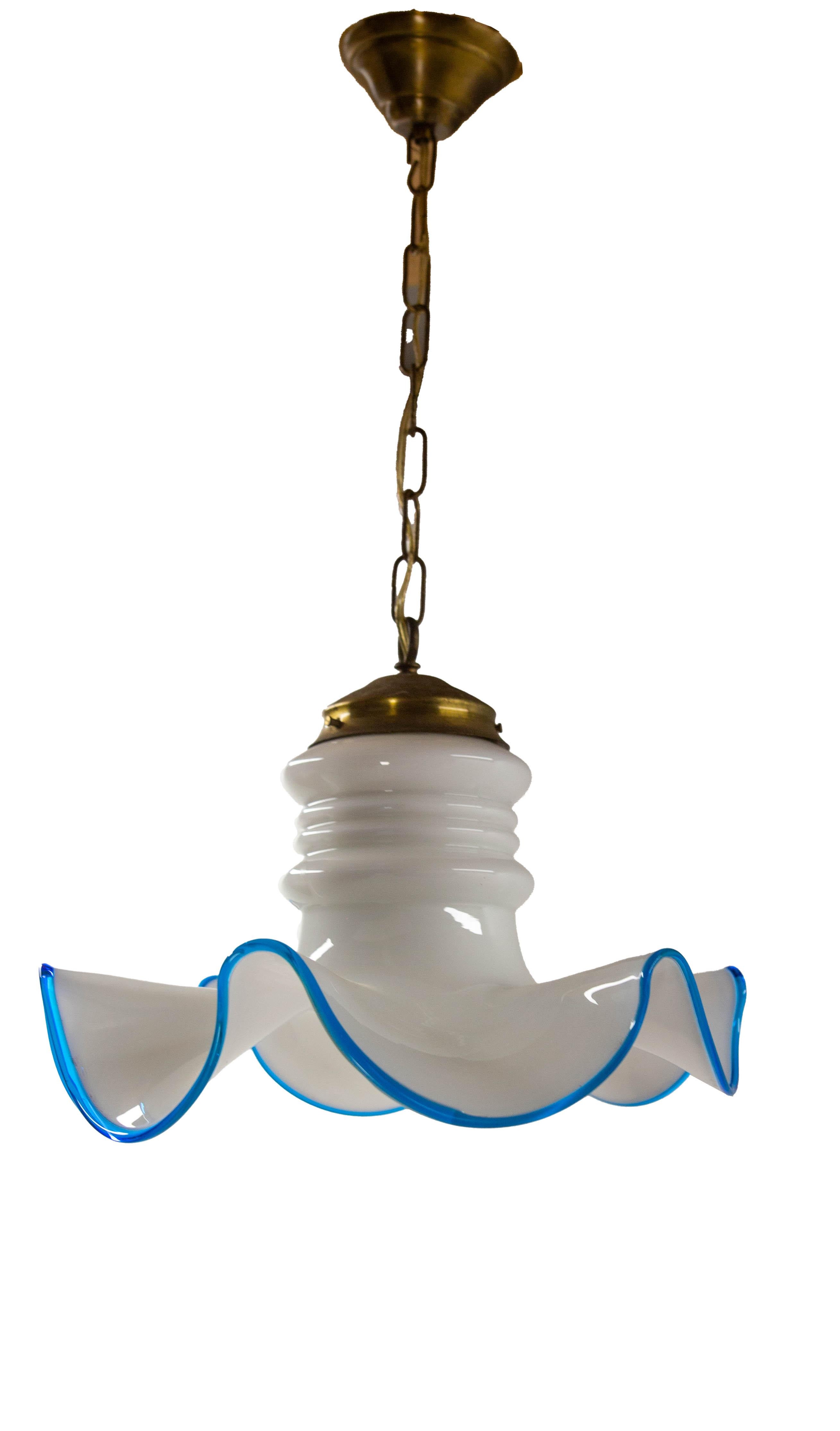 Ceiling lamp mid-century. White opaline with a blue glass border and brass, typical vintage model.
Good original condition.
Soft and pleasant light.
This can be used with USA or European standards.
The bulb is not furnished.

Shipping:
D35 H25 2 kg.