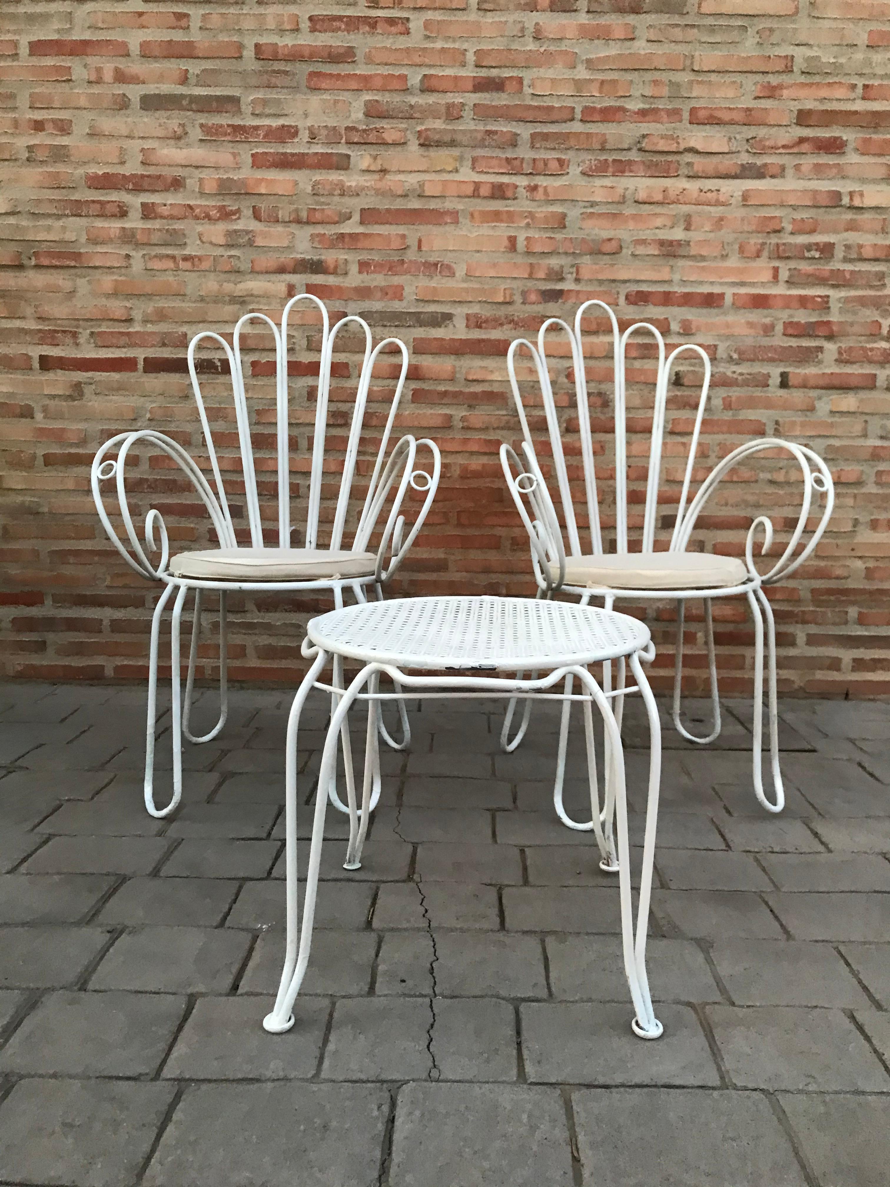 French wrought iron painting set of garden bistro outdoor

Table measurements:
Diameter 22in
Height 15.75in.

Chair measurements:
H 35.43in
W 22.44in
D 22.44in
Height to the seat 15.35in.

  