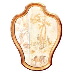 Petit miroir français en forme de violon en bois doré