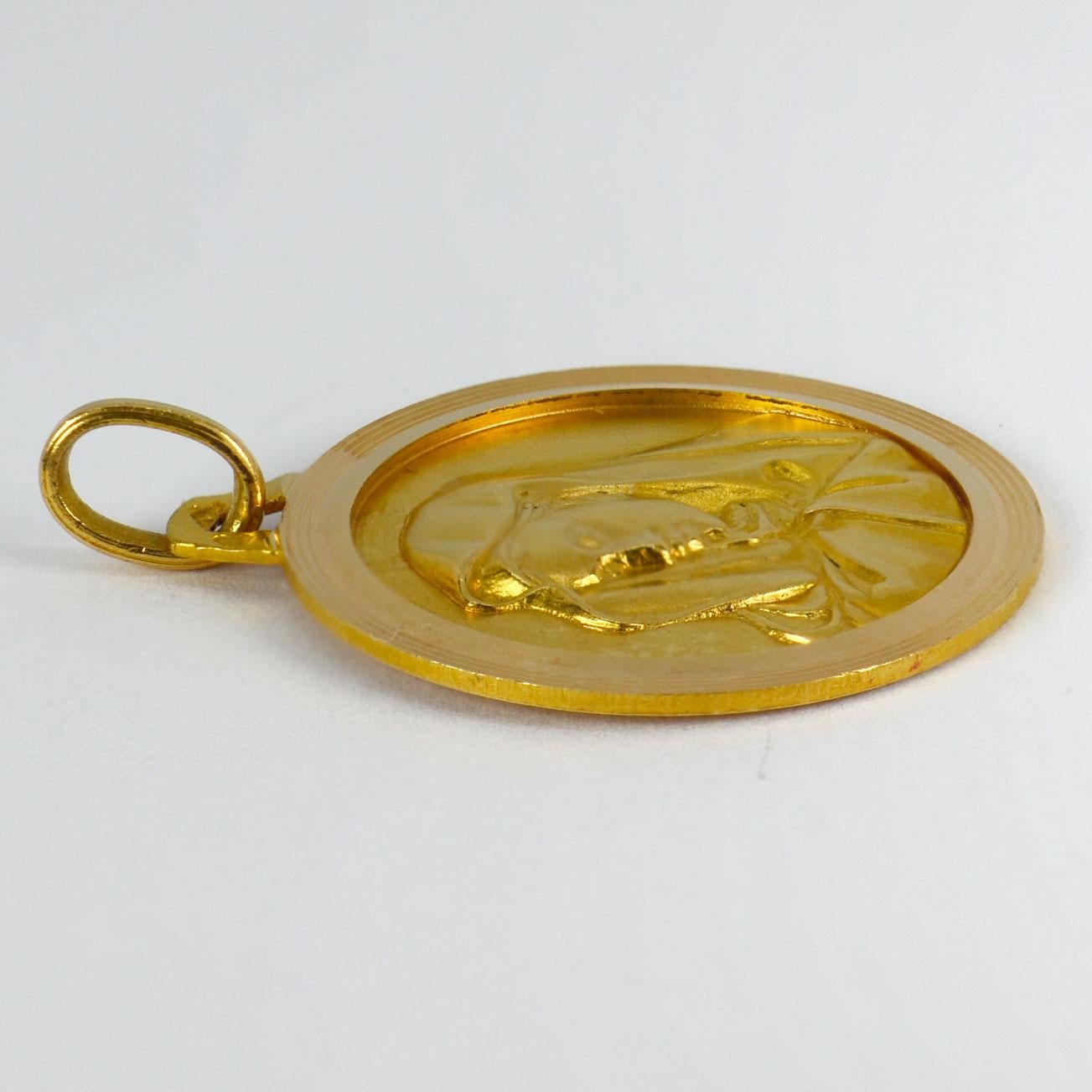 mother mary gold pendant