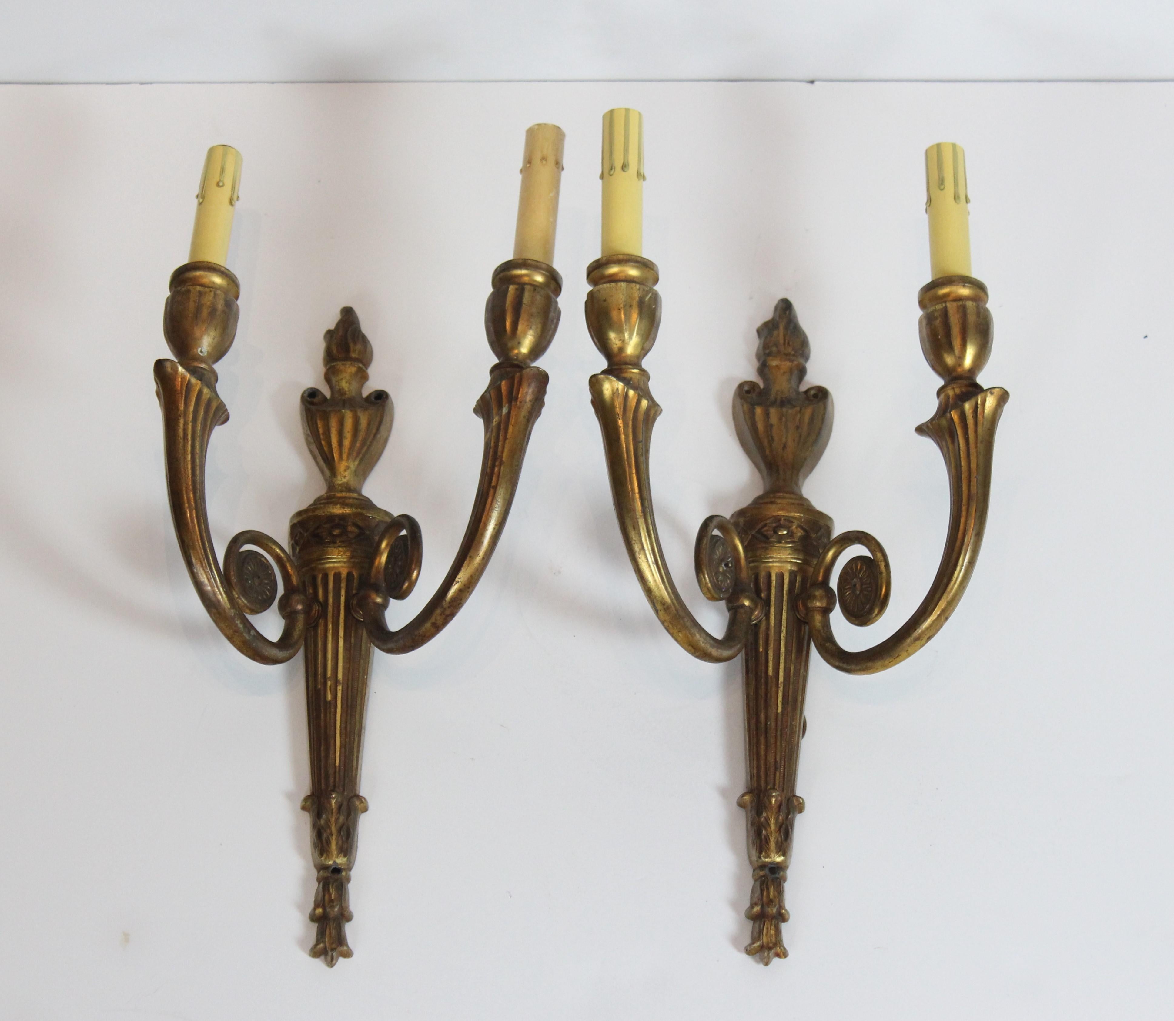 Beautiful pair of gilded brass French wall fixture. Wired for US.