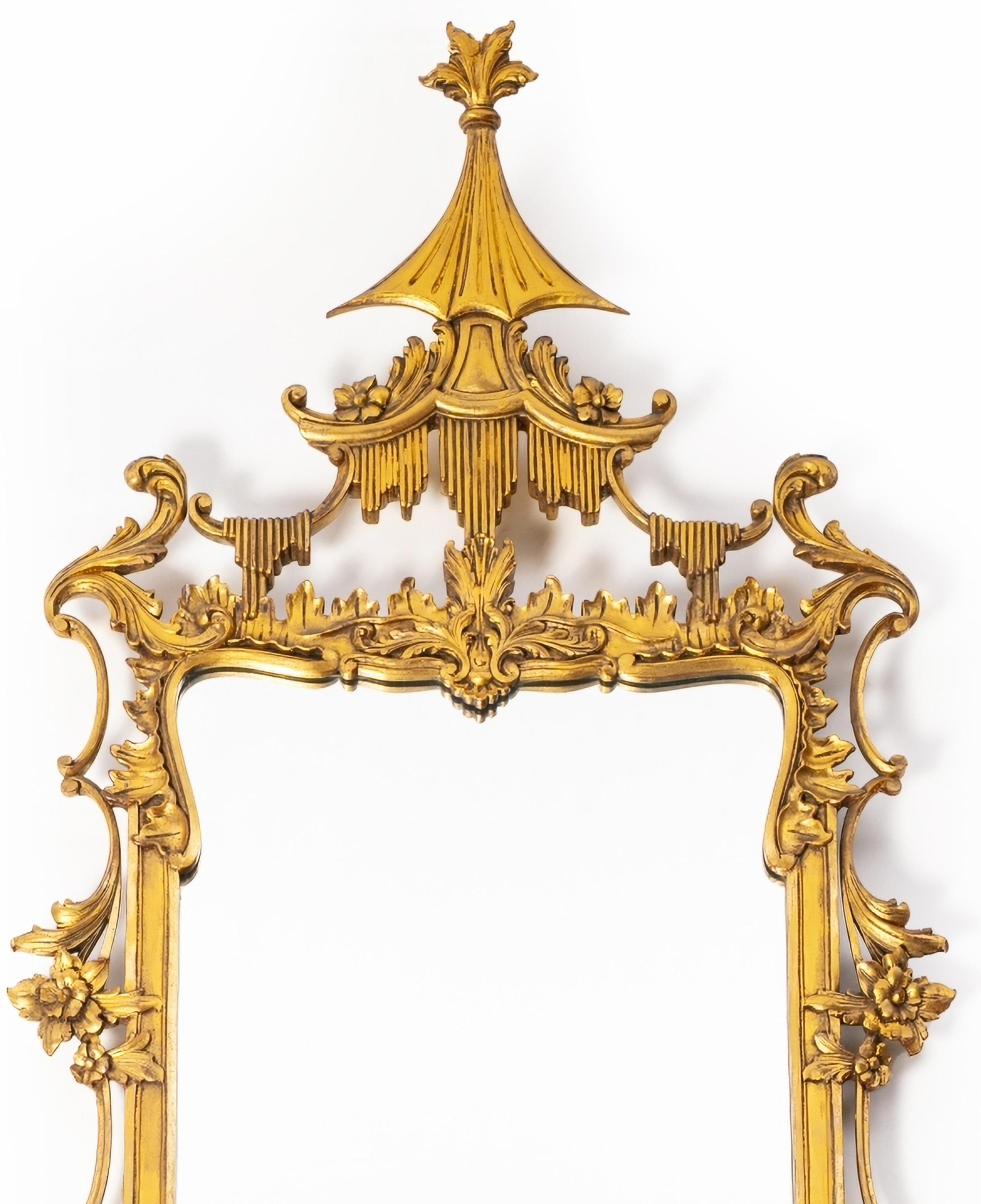 FRENCH WALL MIRROR 20th Century

in carved, pierced and gilded wood, decorated with plant motifs.
Usage signs.
Dim.: 135 x 64 cm
good conditions