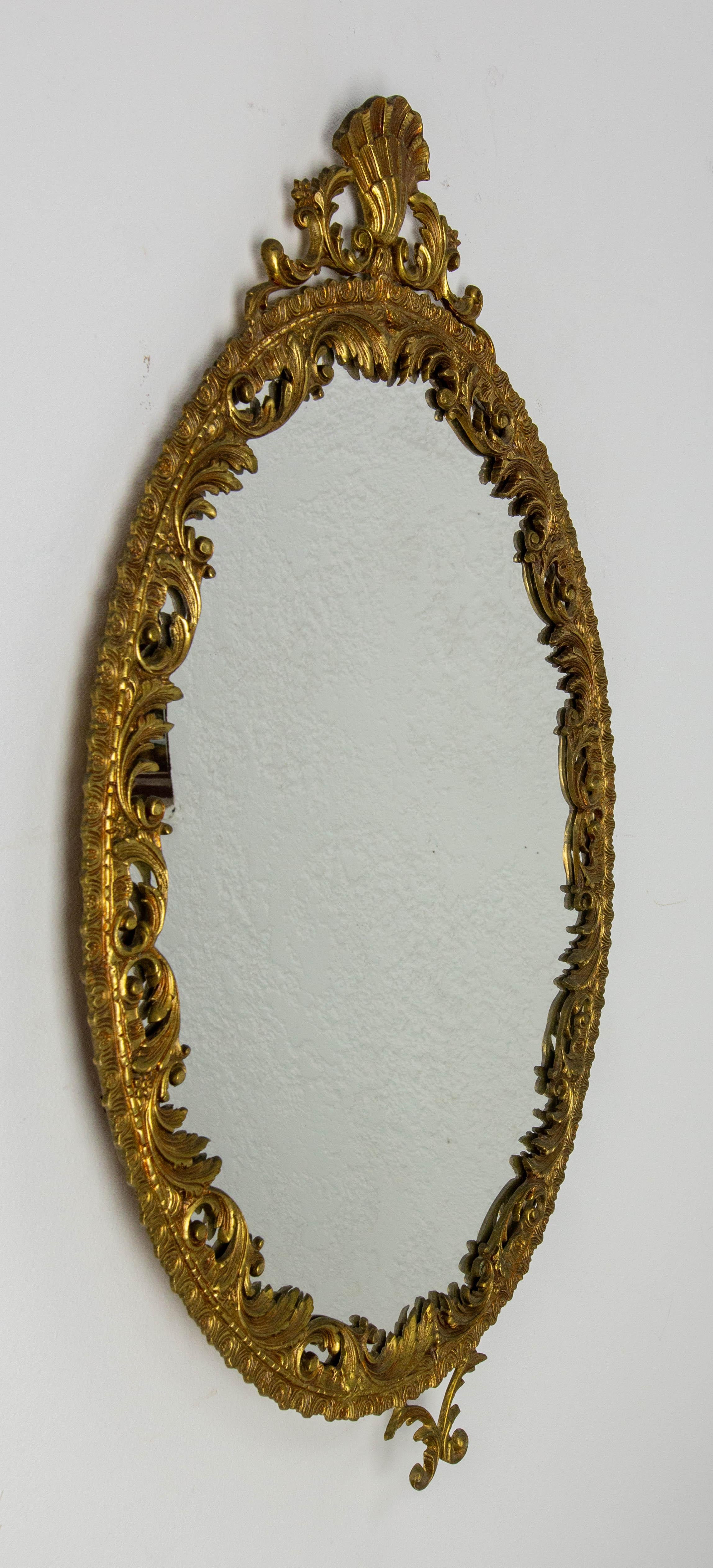 Rococo Revival French Wall Mirror Brass Frame with Rocaille Patterns Louis XV style, circa 1960
