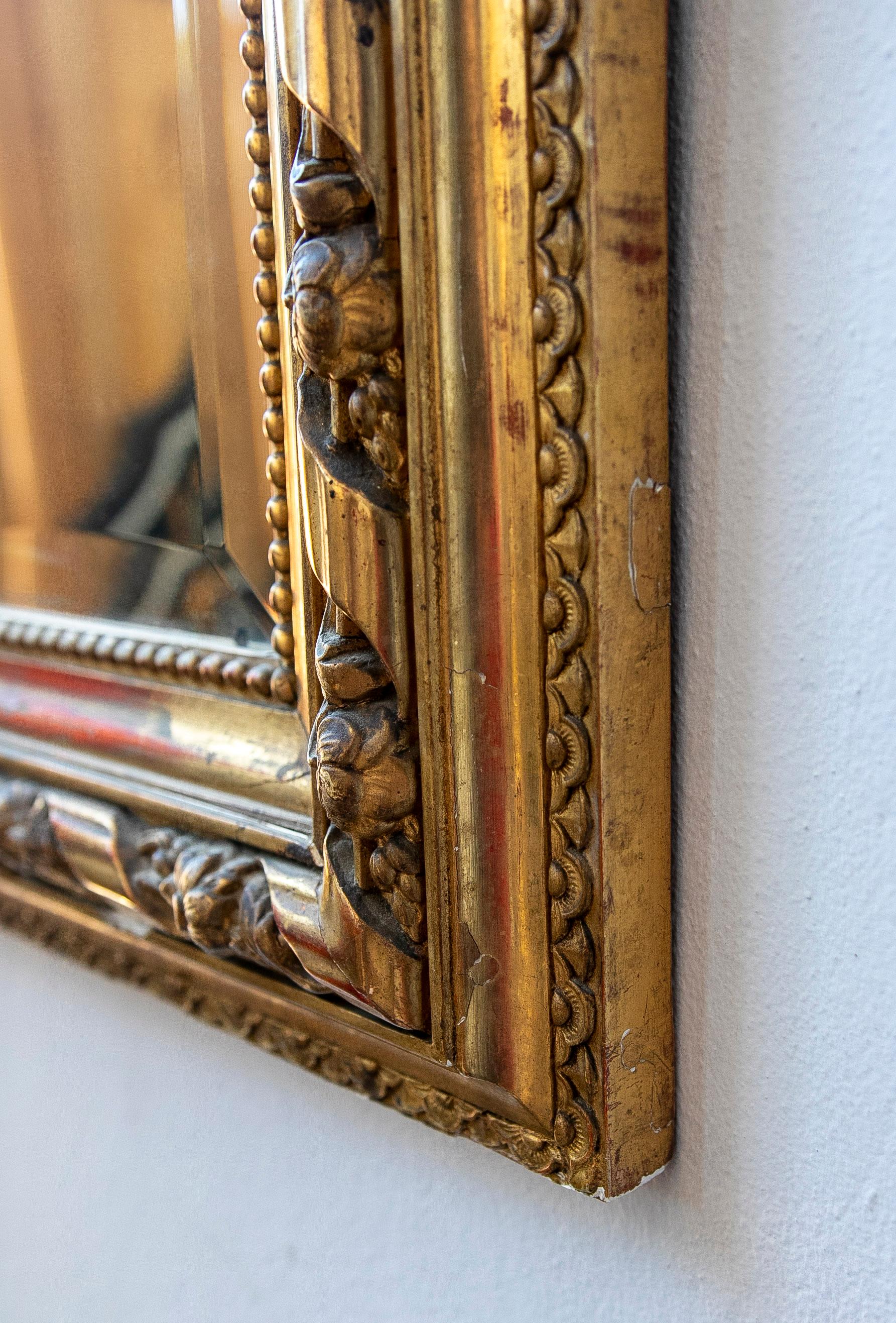 French Wall Mirror in Gilded Wood with the Coping Top Decorated with Instruments For Sale 14