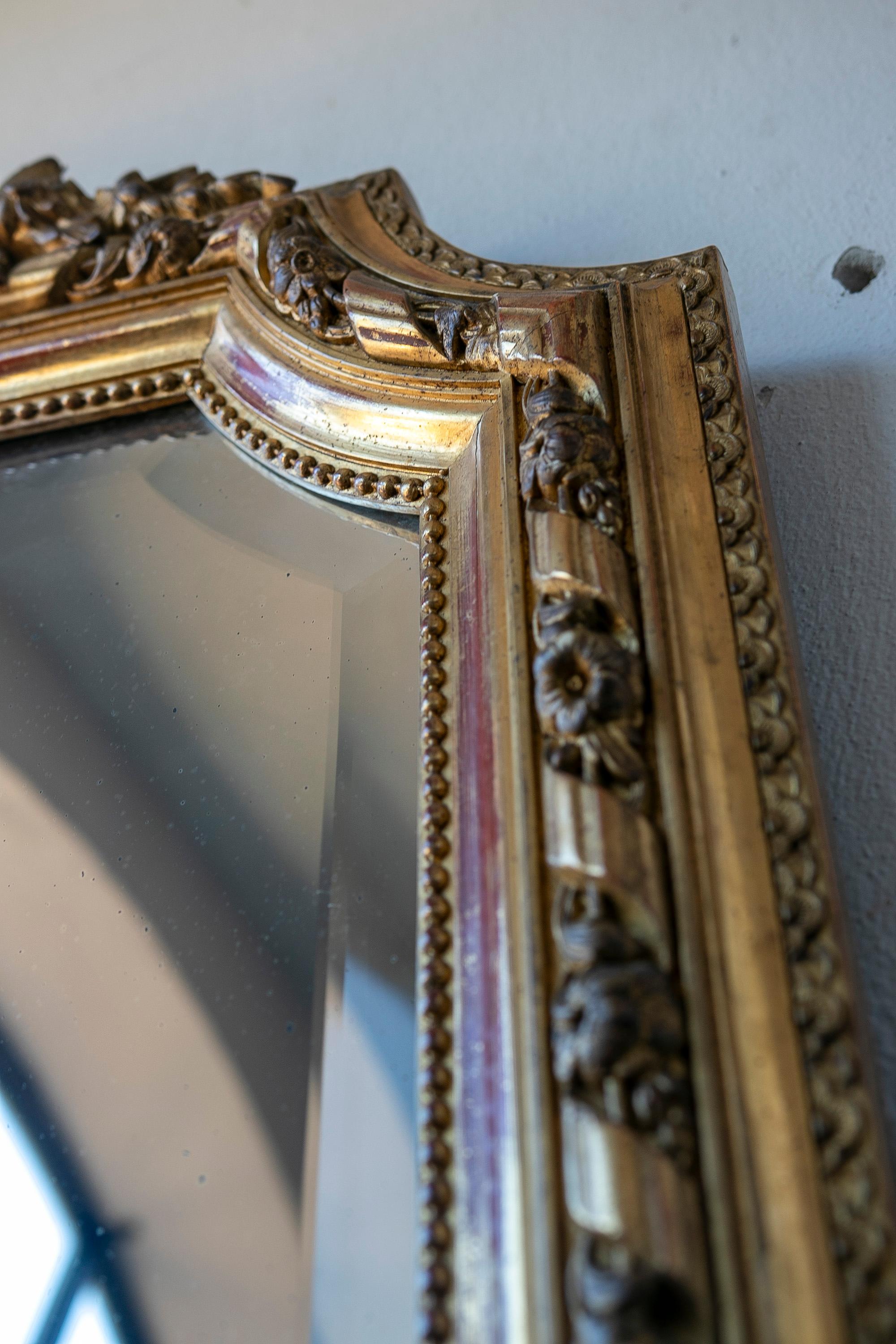French Wall Mirror in Gilded Wood with the Coping Top Decorated with Instruments For Sale 4