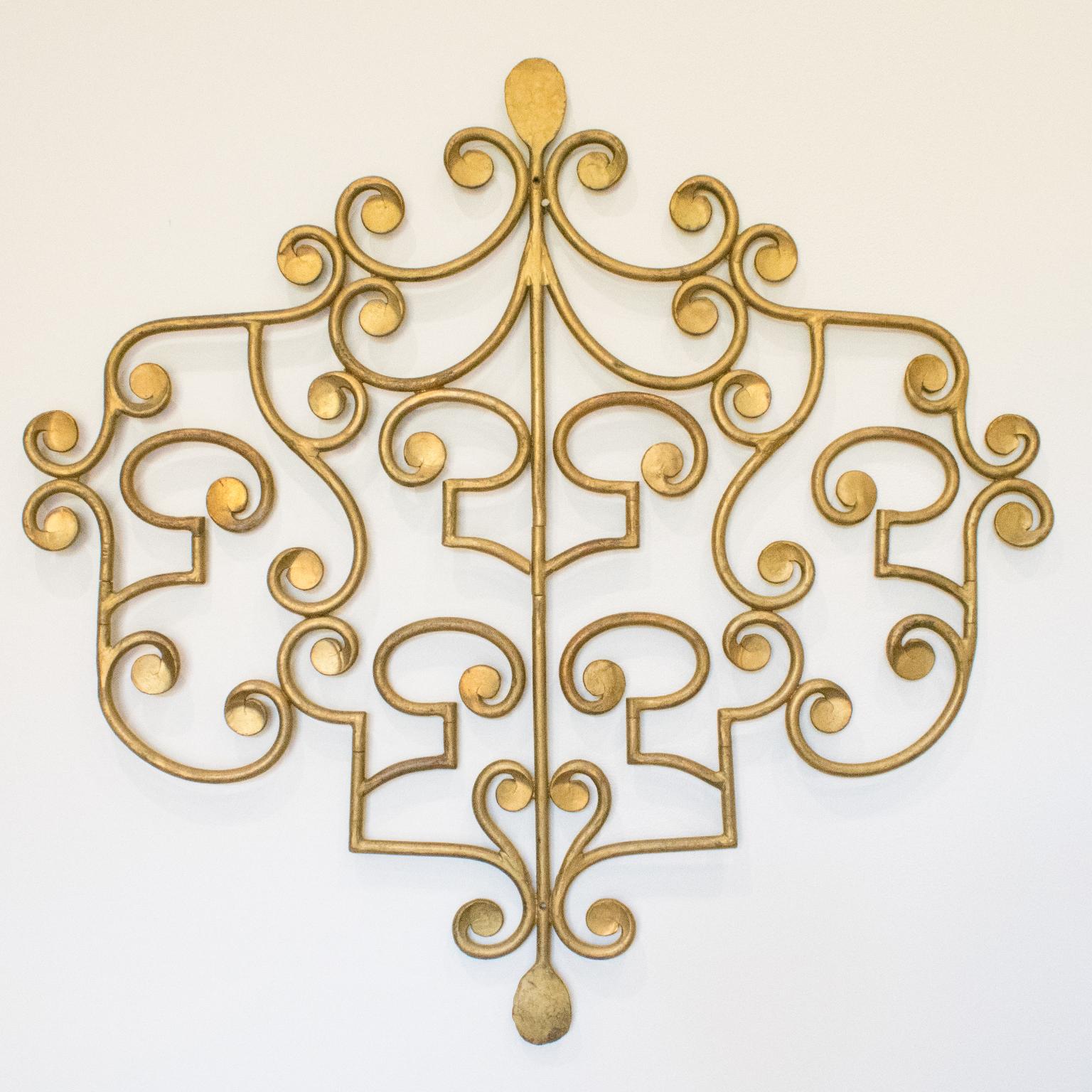 Stunning French wall-mounted gilt metal coat rack, hanger. Very unusual flat or raised shape. Lay it flat and this coat rack becomes a lovely wall metal sculpture, with fine detailing and high ornamental flair. You need it as a coat rack, just