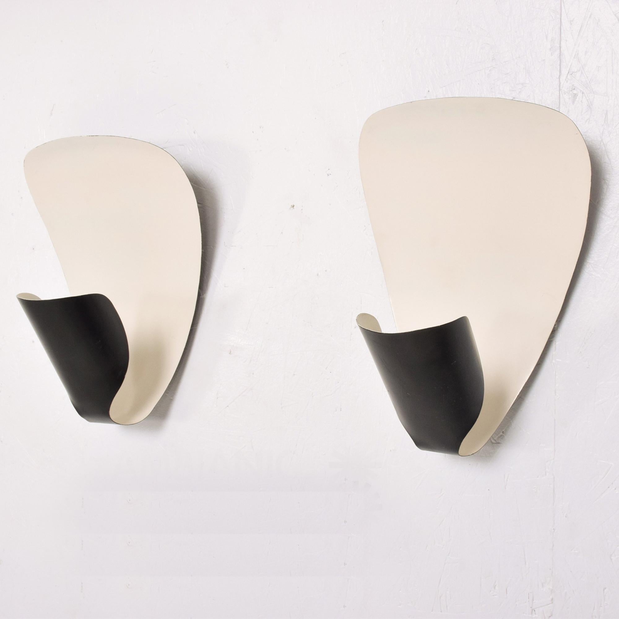 Sconces
A pair of Modern French Wall Sconces B206 by Michel Buffet. Reedition 2017 
Michel Buffet B206 black and white wall lamp. Originally designed in 1953, the later production pair was made with many of the same techniques and craftsmanship as