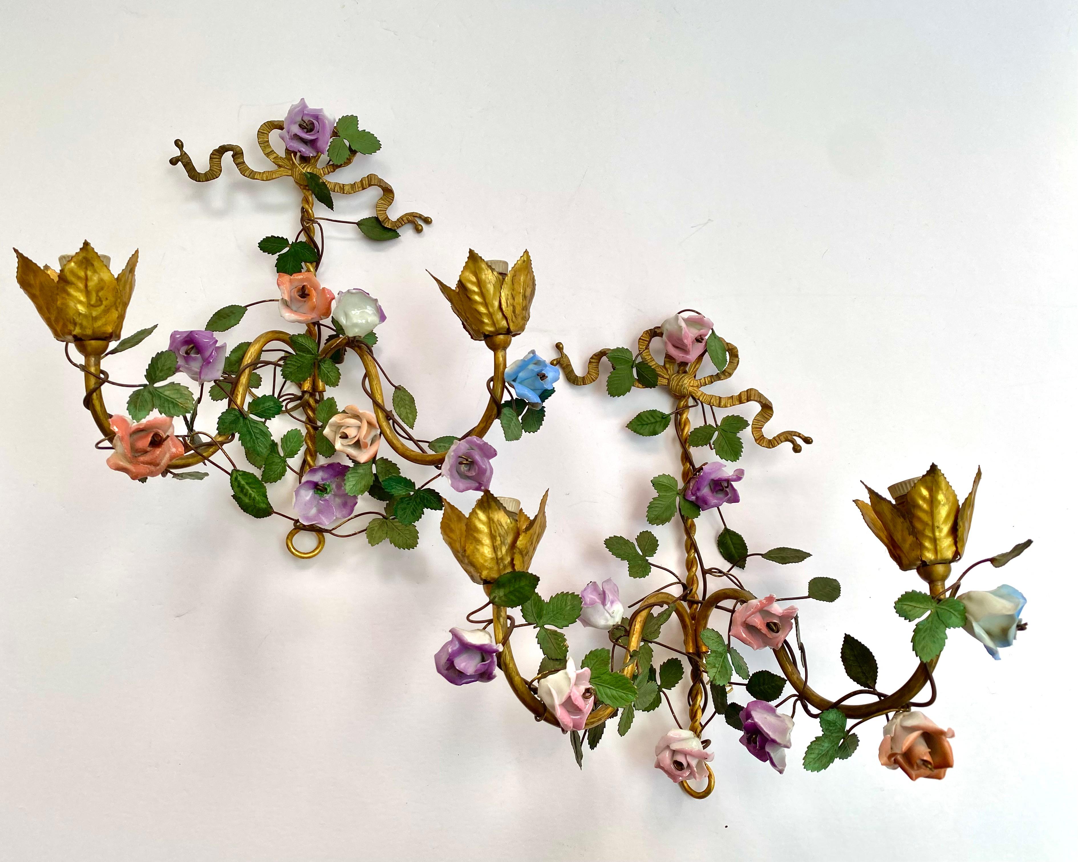 Collection of antique French wall sconces with two arms and flower design. Circa 1930s.

Fabulous Pair gilt metal candle sconces with porcelain flowers and brass rose bouquet.

Very nice design with lots of details and high quality