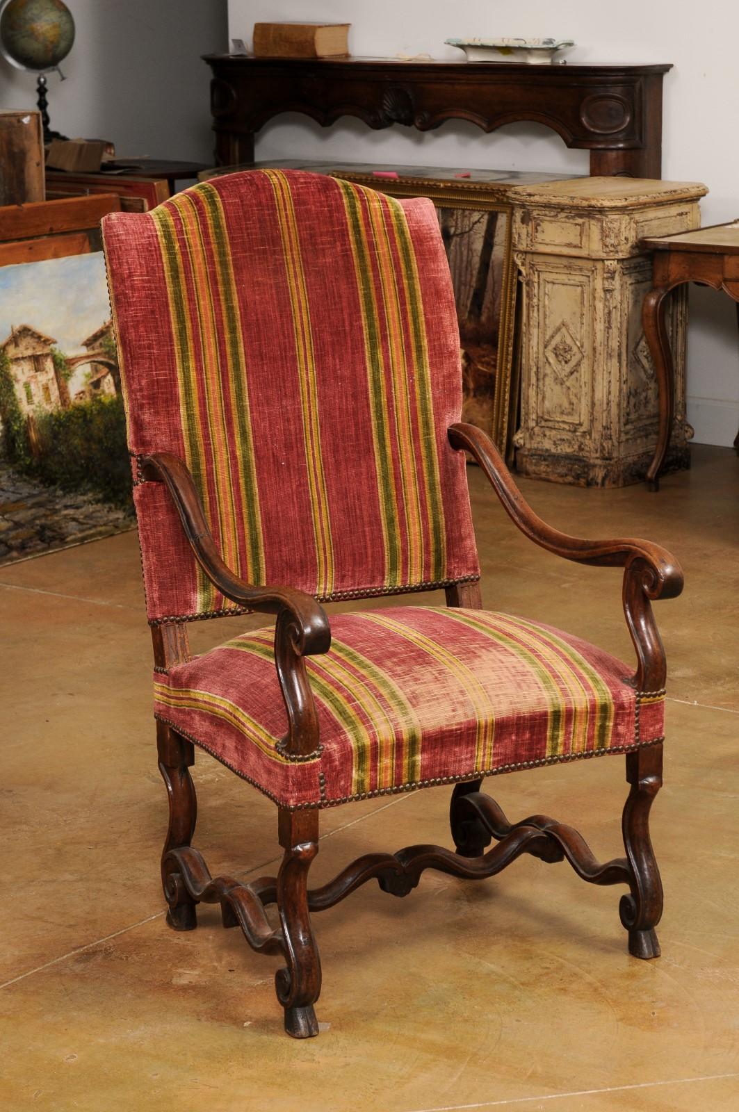 Carved French Walnut 1790s Louis XIV Style Fauteuil with Large Scrolling Arms