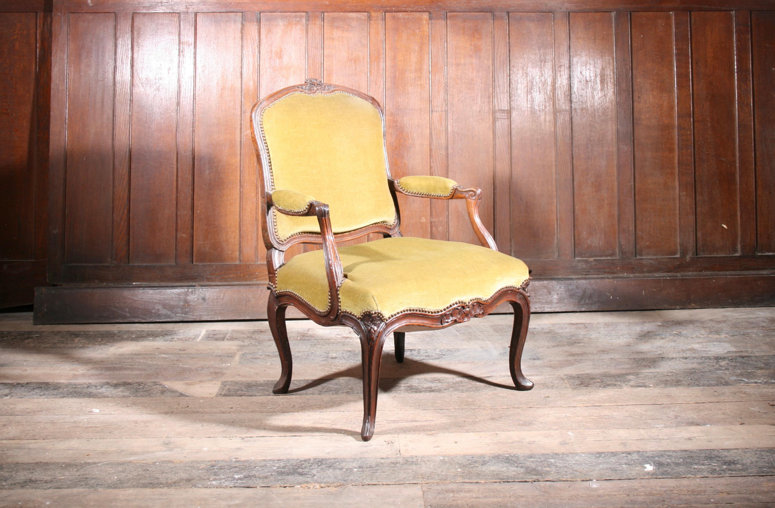 French Walnut 18th Century Armchair c.1770, with extra wide seat.  Good solid condition and very comfortable.

