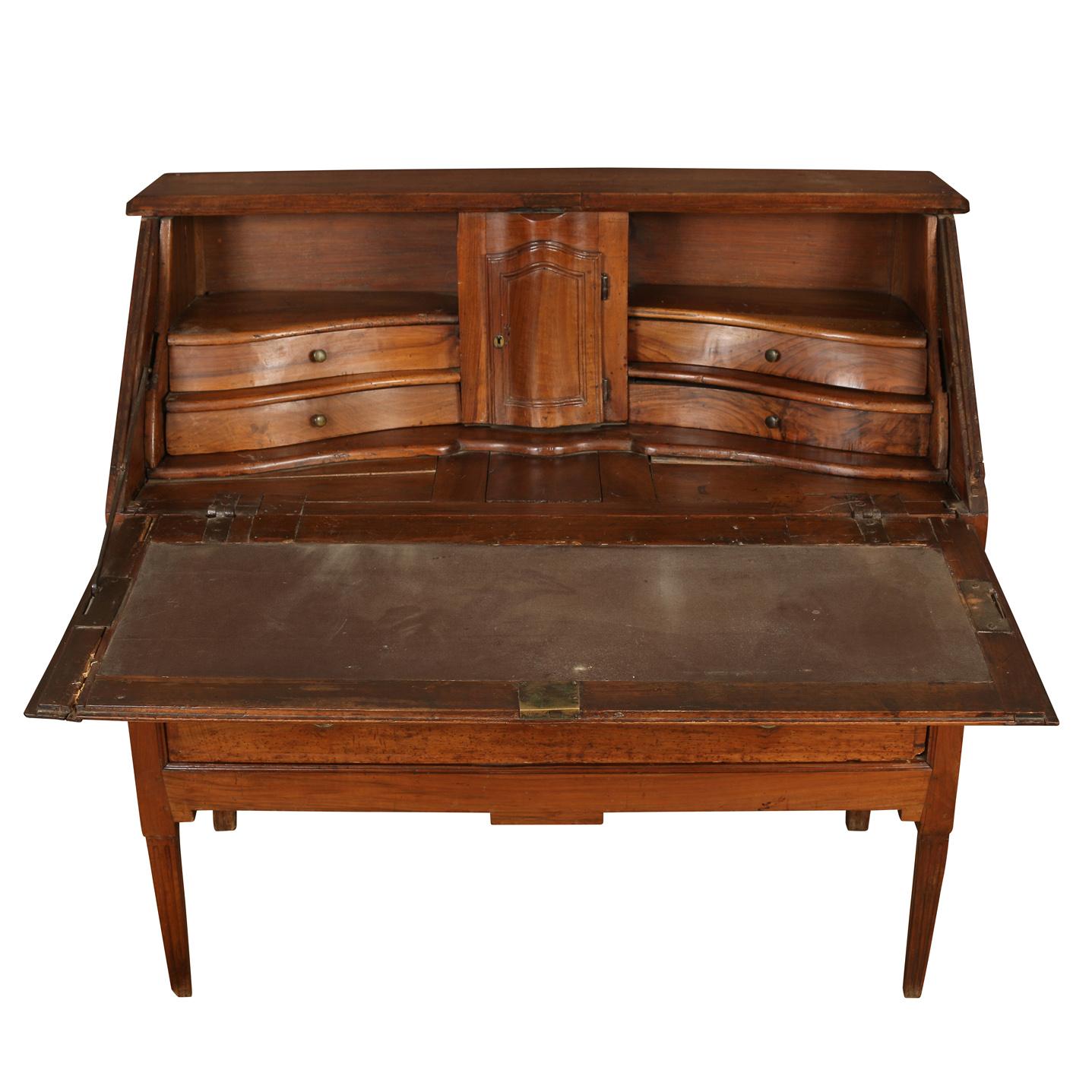 French walnut 19th century slant front secretary chest or desk with storage in three drawers and writing surface opens to reveal beautiful curved drawers and hidden cubbies. When open measures 37