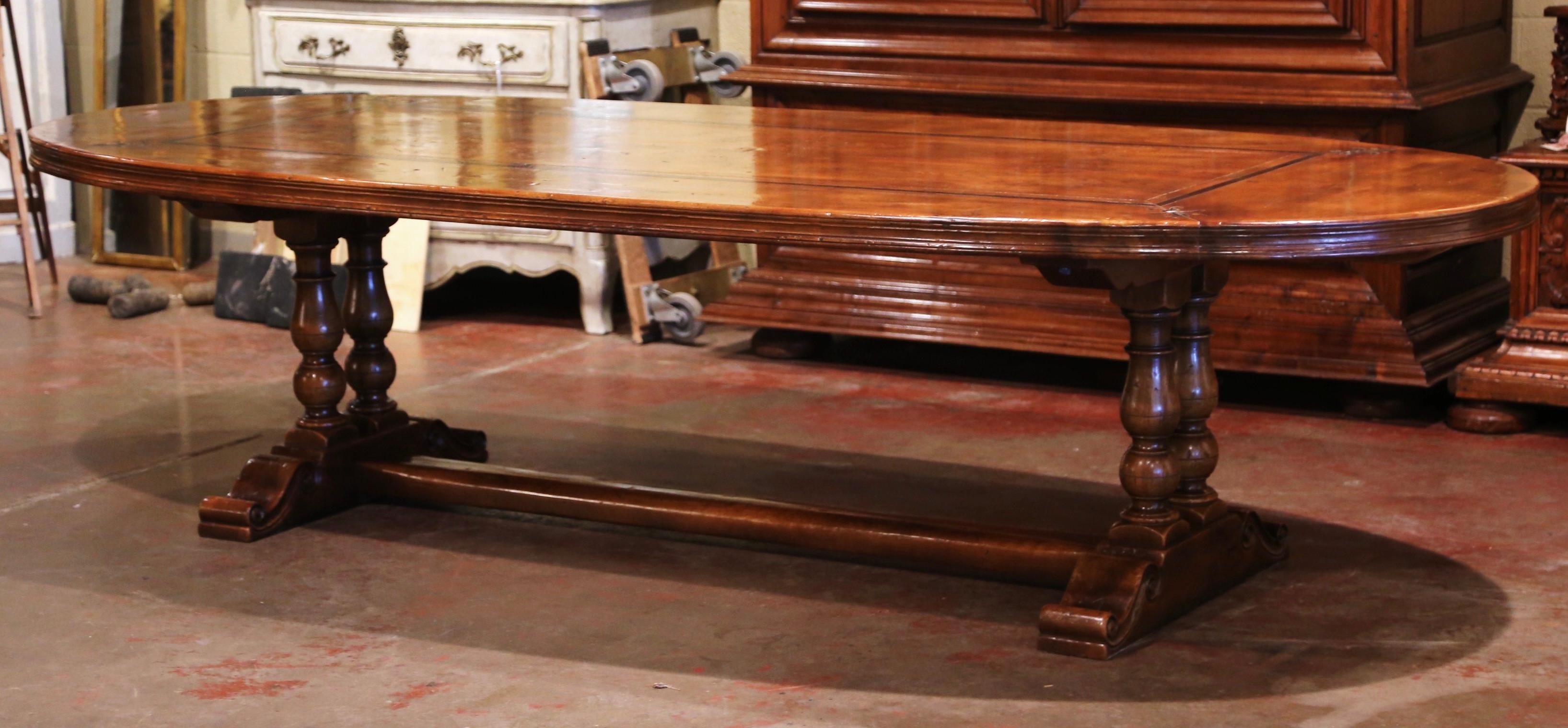 Louis XIII French Walnut and Chestnut Oval Trestle Dining Table with Fleur de Lys Decor