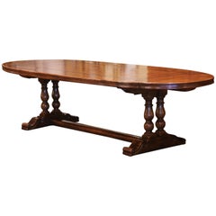 French Walnut and Chestnut Oval Trestle Dining Table with Fleur de Lys Decor