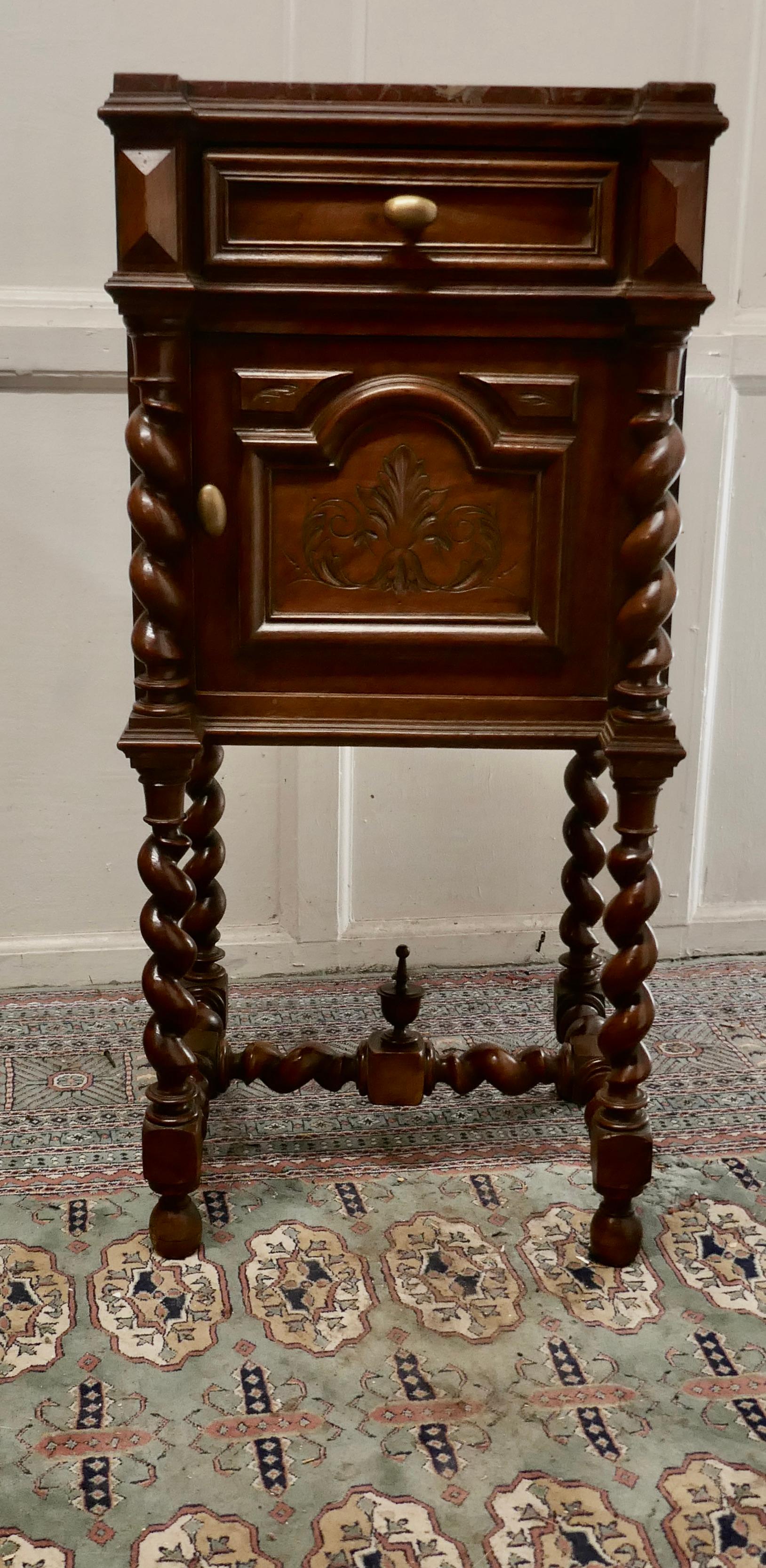 French walnut Barleytwist night table or side cupboard

This is a very attractive piece of furniture from Brittany, the cabinet has a small drawer at the top with a cupboard beneath and it has attractive Barley twist turnings on the front and