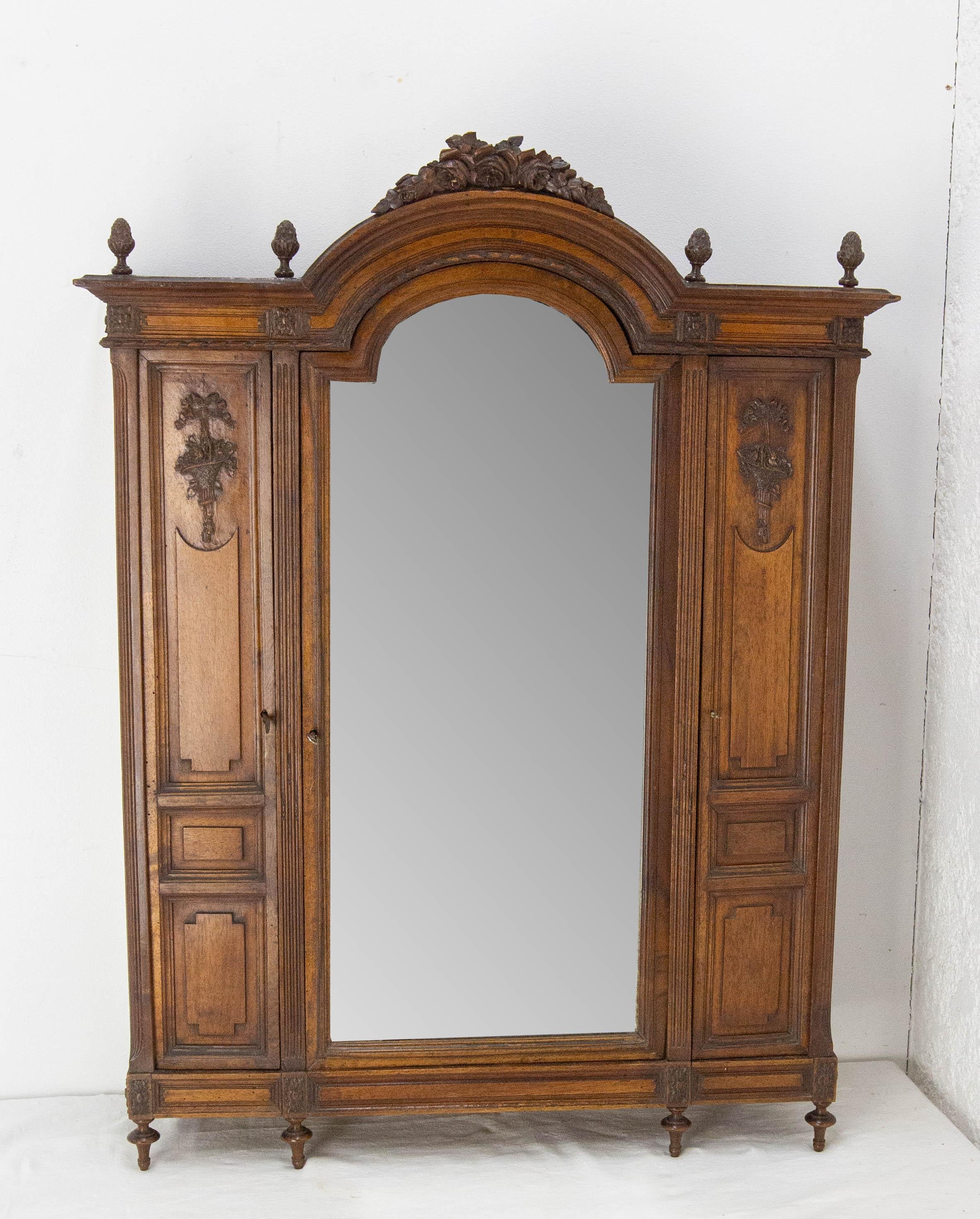 Oak little walnut armoire chef d'oeuvre of a cabinetmaker.
 In its original sense, a masterpiece is a piece that marks the completion of an artisan's training, who, through this production, will move from the status of journeyman to that of master,