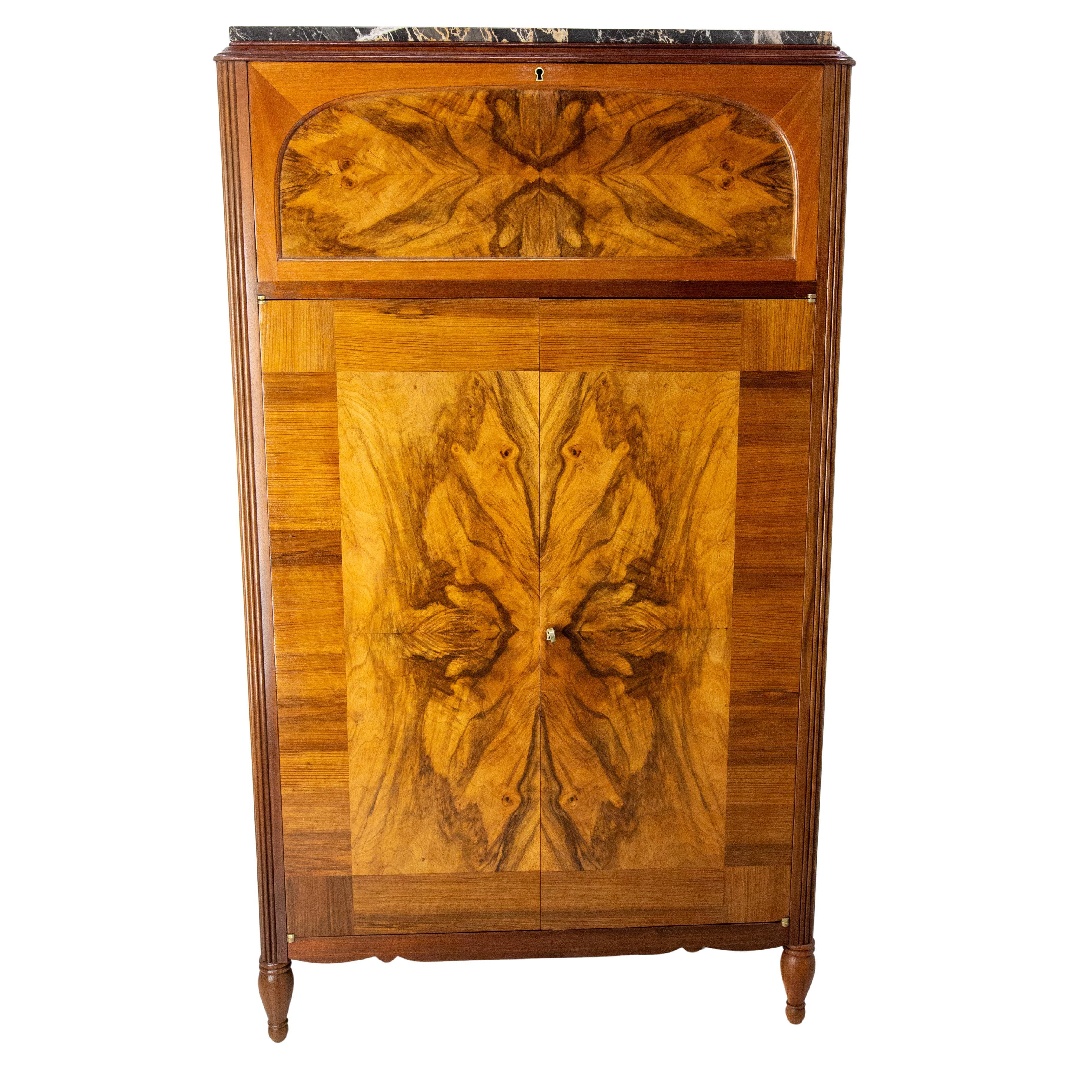 French art déco administrative storage unit with 26 drawers and storage cabinets. Each drawer has its own handle and label holder.
Interior dimensions of drawers 13.99 x 12.40 x 1.38 in. (34 x 31.5 x 3.5 cm)
The marble top is of very fine quality