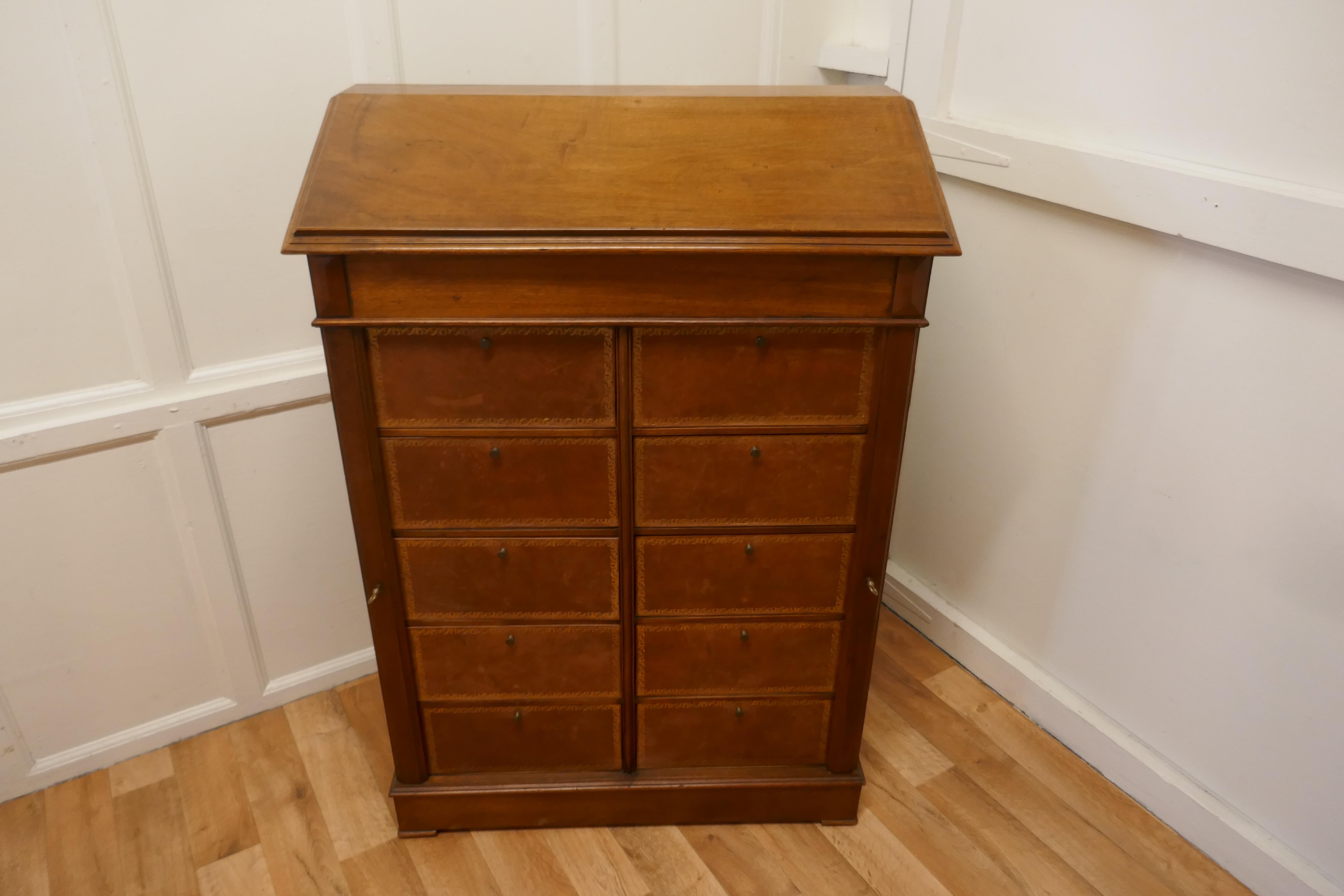 French walnut Cartonniere wellington chest filing cabinet, reception hostess greeting station

This is a traditional French Cartonniere, it is a double bank of 10 tooled tan leather filing compartments in a Wellington style lockable cabinet with