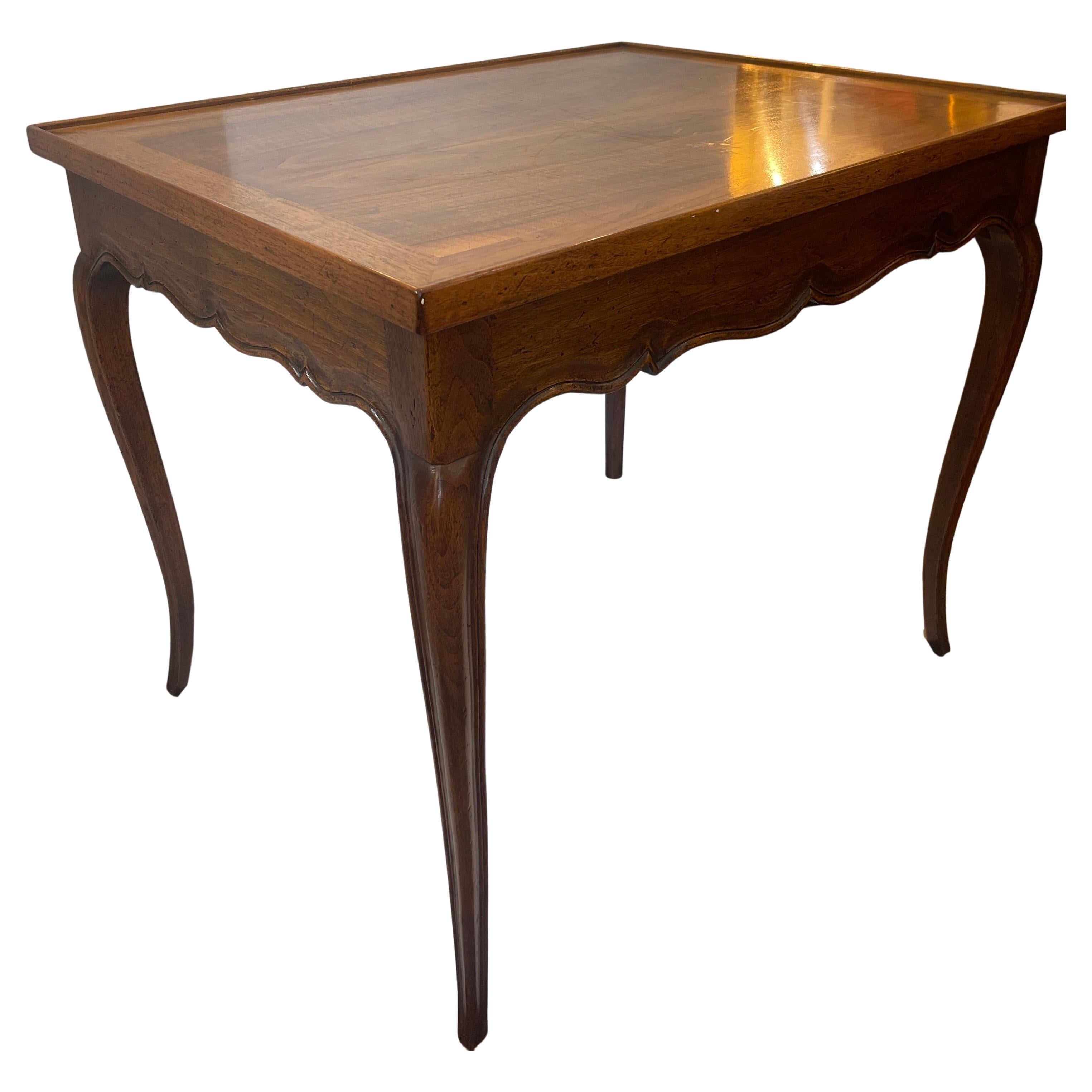 This a charming French  Walnut Carved Card table or center table has a Wood Gallery and Cabriole Lags 
This table is circa 1940-1950.
Beautiful Walnut wood, great honey color and details.
Very good to excellent condition, consistent with age and
