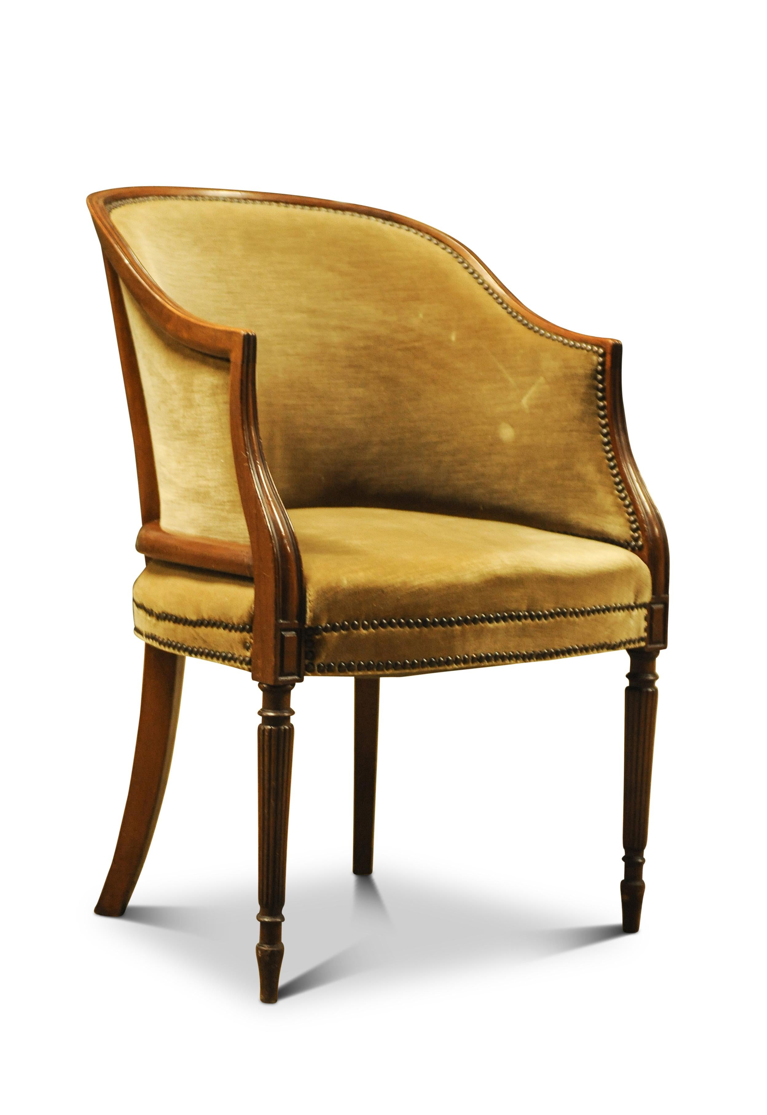 French Walnut Framed Velvet Tub Chair With Brass Studded Borders Raised on Tapered Supports

Classic tub chair well suited to a reading room, or hallway.

Height to arms 70cm
Width of seat 49cm
Depth of seat 45.5cm