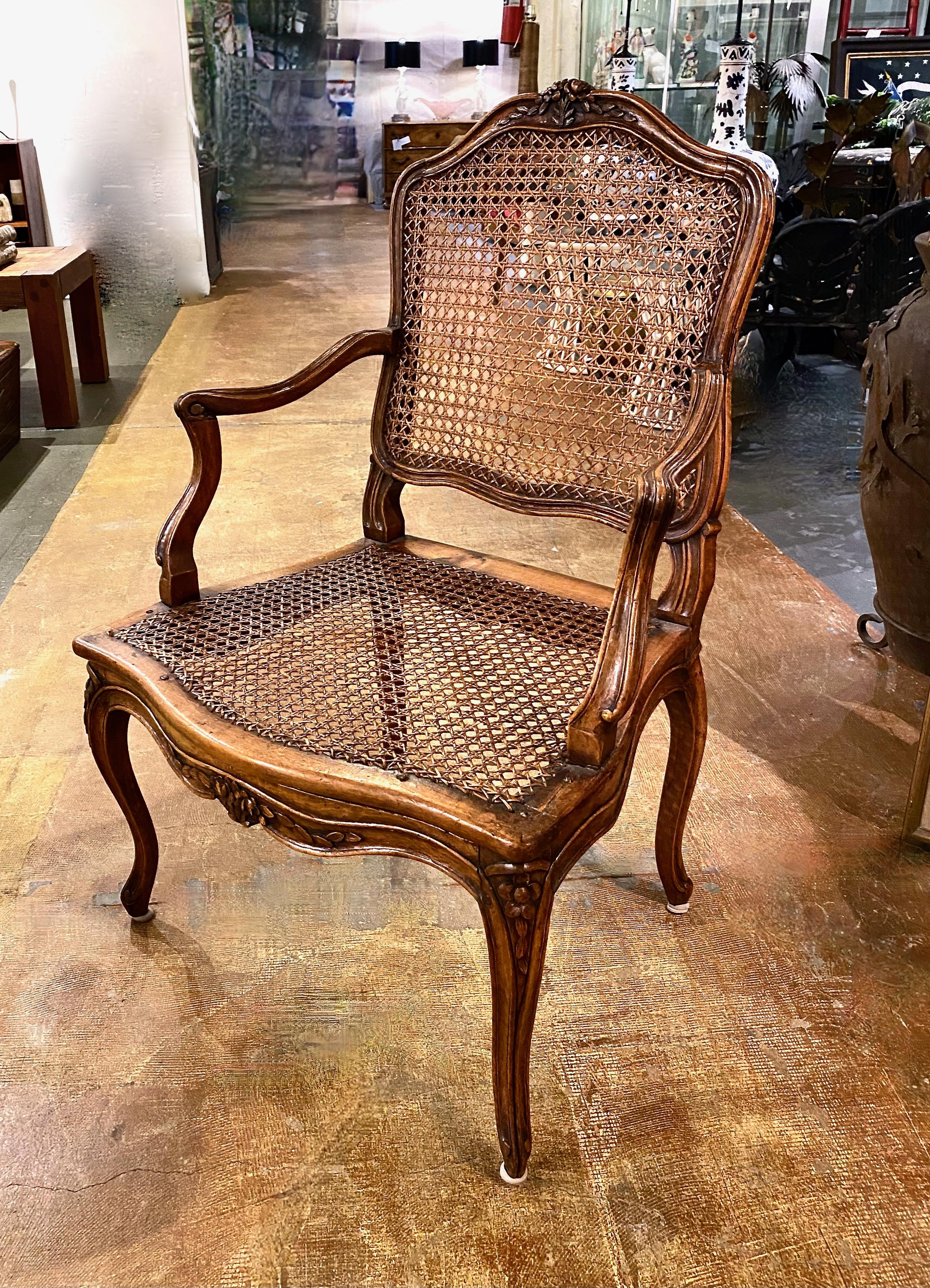 This is a superb set of 6 antique late 19th century solid walnut dining chairs. This is a harlequin set as the two arm chairs are just slightly different from the four side chairs. The chairs have been recaned in the not-to-distant past and are all