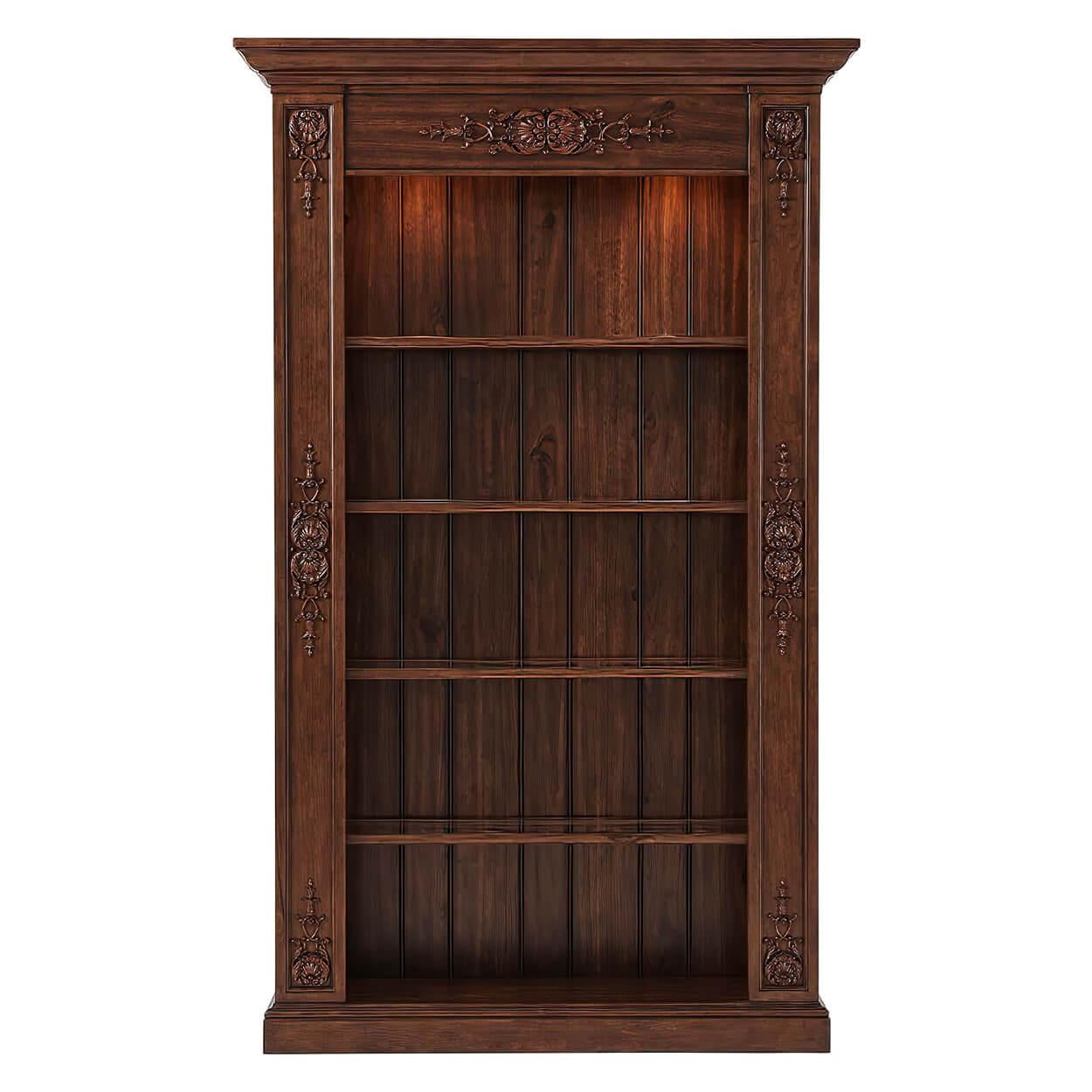 A French walnut open bookcase with a molded cornice with carved shell and leaf medallion panels, with LED lit interior and glass inset wood framed shelves. The rear panels with planked detail and raised on a square and stepped plinth base.