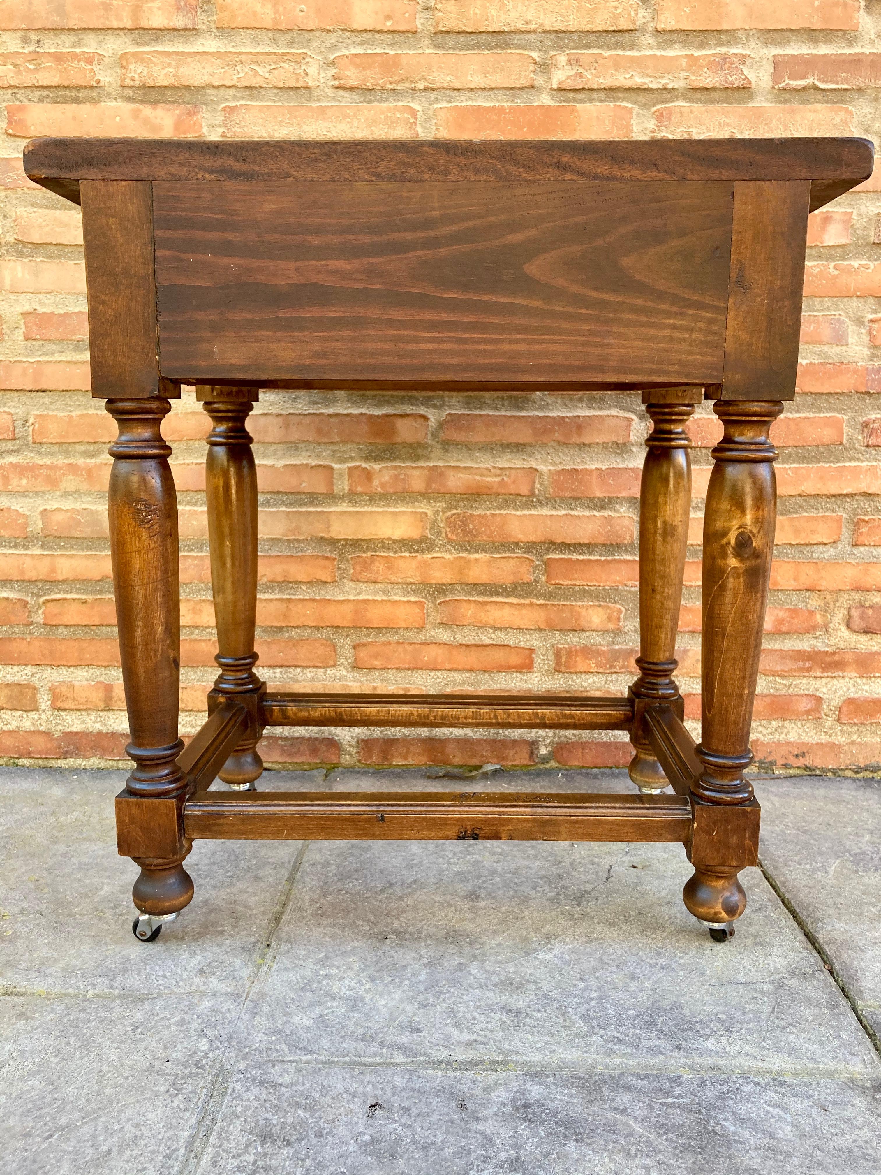 19th Century French Walnut Side Table with Drawer, Carved Arches and Column Legs with Wheels,