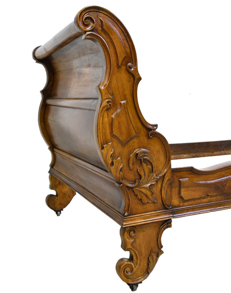 French Walnut Sleigh Day Bed with Articulated Carvings in a Provincial