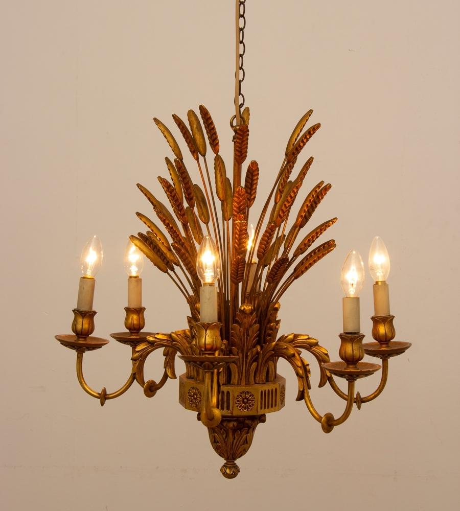 This is a lovely quality wooden example of the wheatsheaf Classic French design chandelier.
We have cleaned off the body and re wired the chandelier.