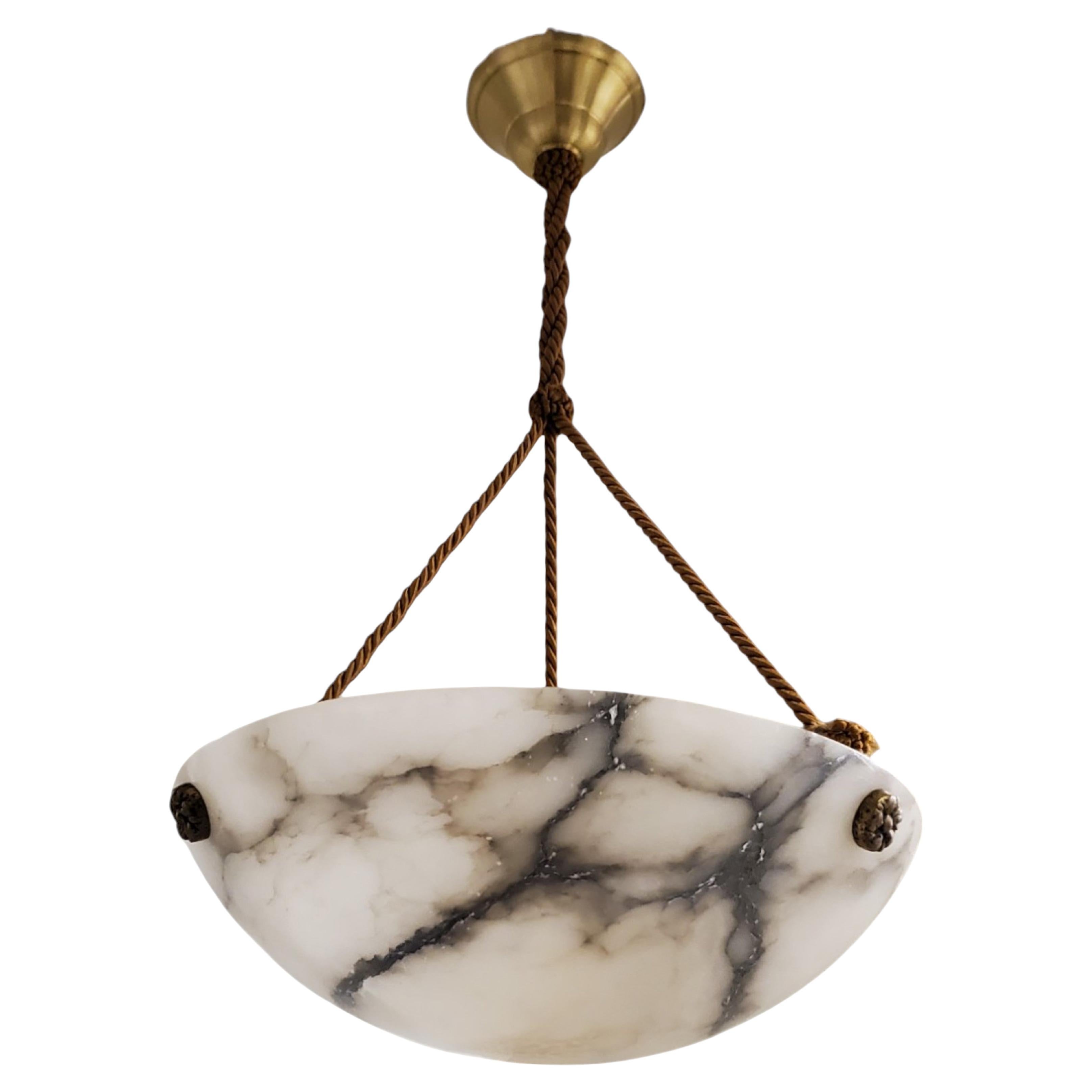 An original French Art Deco alabaster bowl shape pendant with highly contrasting charcoal grey veining and natural striations overall.
 The background color in white and juxtaposition of the darker grey  creates exciting patterns caused by the