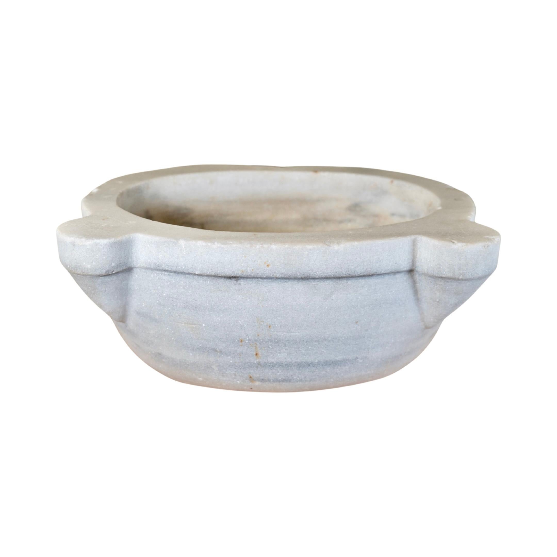 This elegant vessel sink features a deep French white marble bowl and an 18th-century-inspired design. Perfect for a traditional bathroom, it’s a timeless way to give your space a luxurious look and feel. The natural stone brings a durable,
