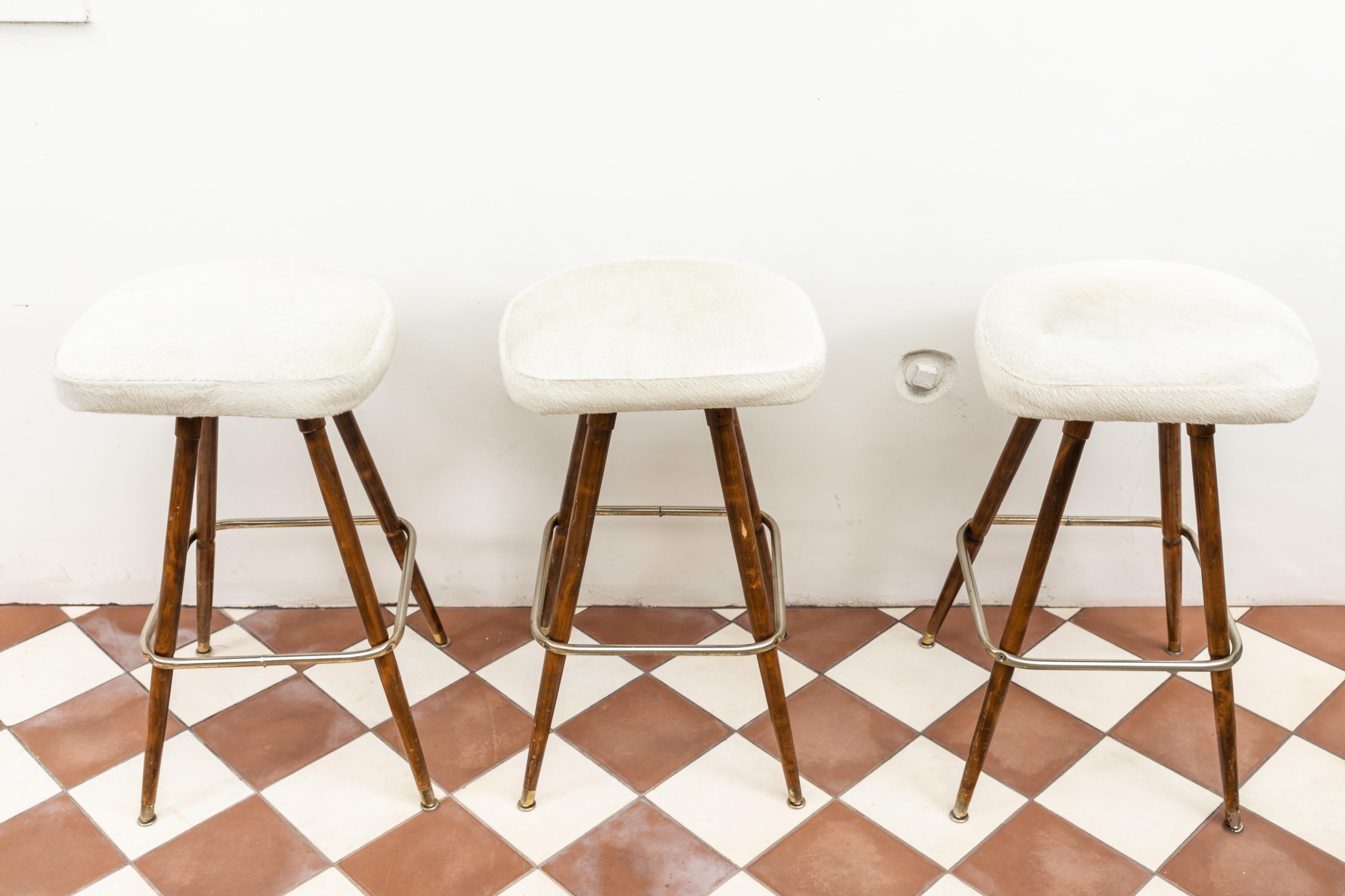 white and wood counter stools