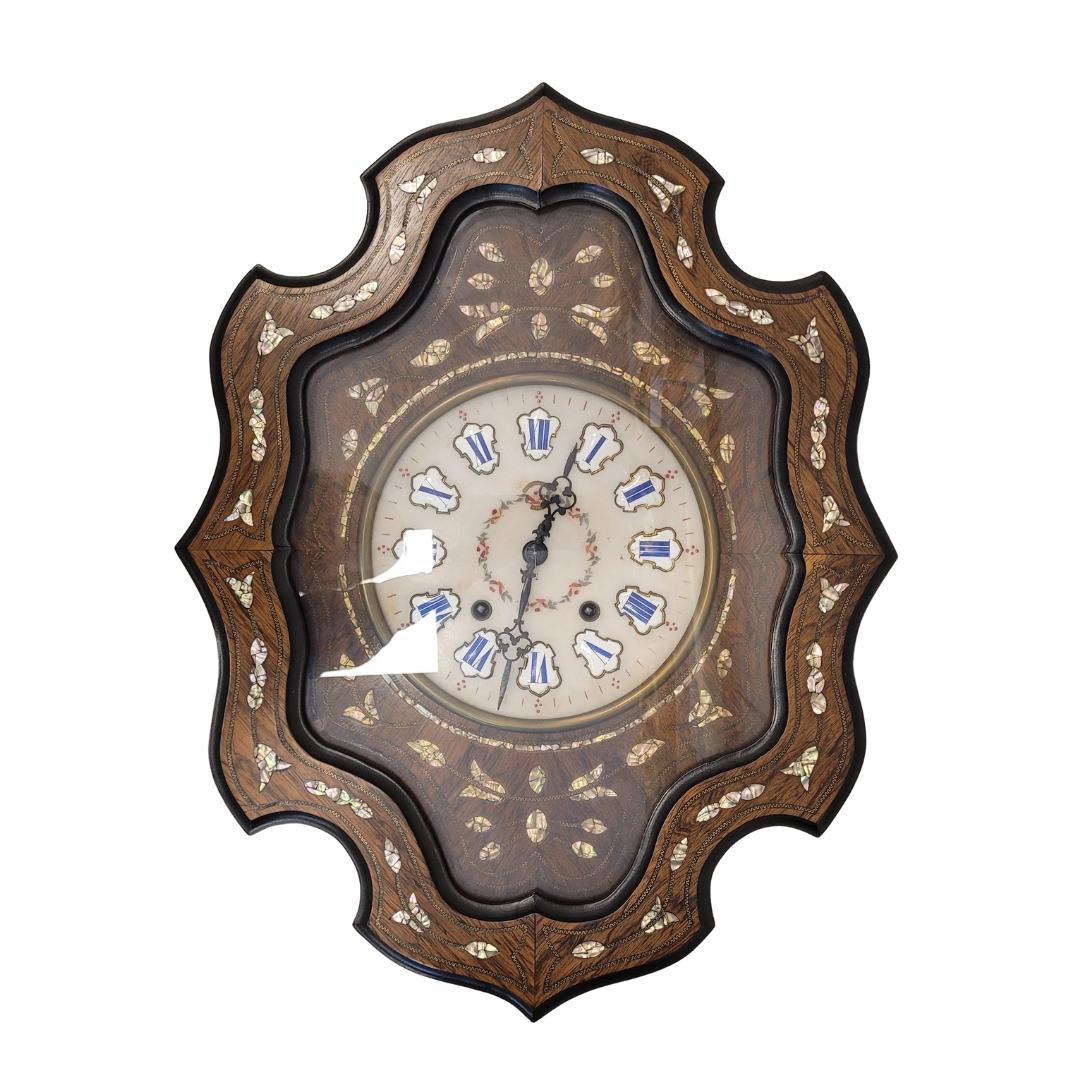 One of a kind  Frenchn wall Clock PARIS.  circa 1870 , Napoleón III.
Precious wood box. Wooden front with Floral inlaid mother of pearl .White marble dial with  floral garland painted . Roman numbering on enameled Porcelain plates. Frames of the